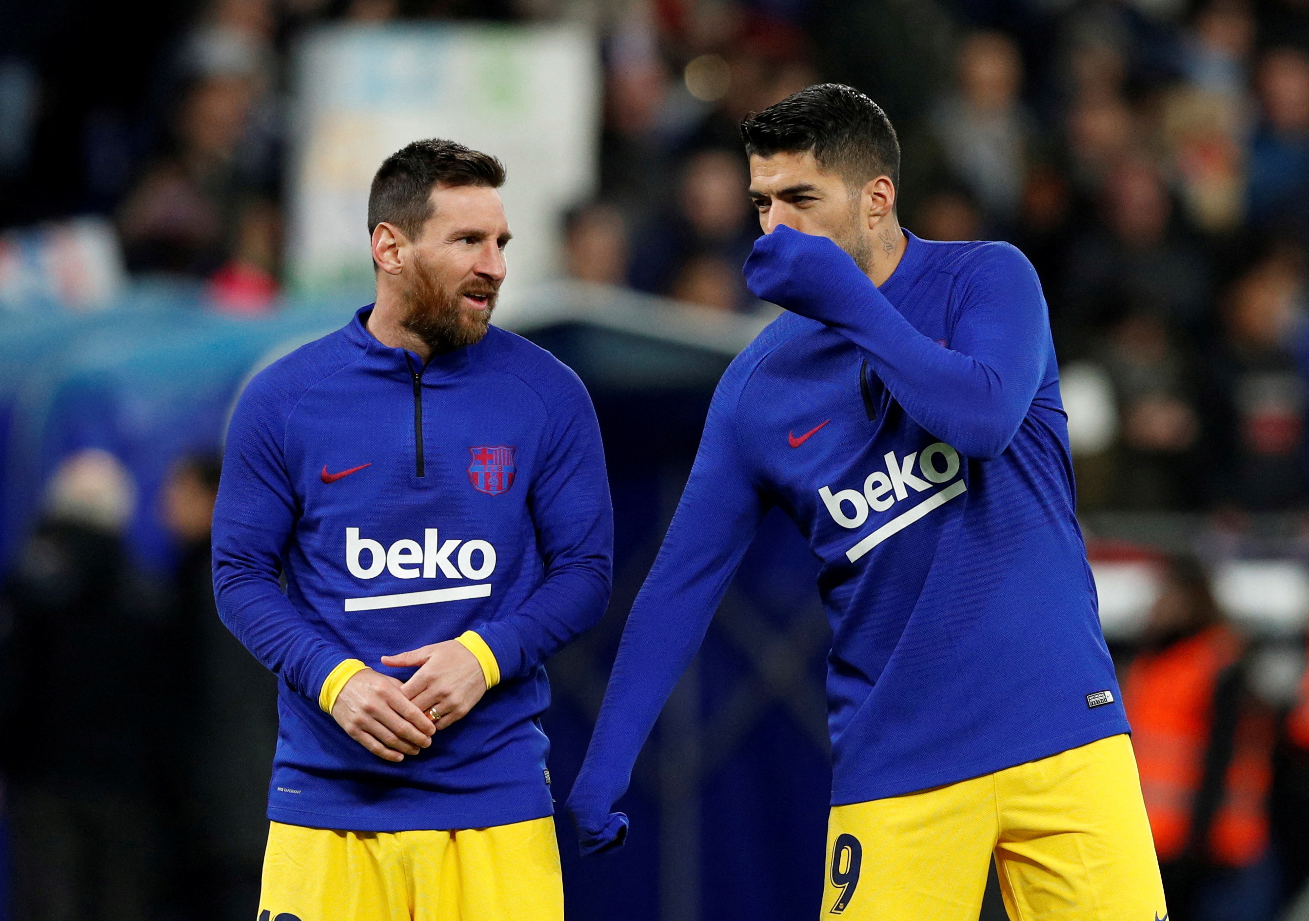 Lionel Messi y Luis Suarez antes de un partido en Barcelona (REUTERS/Albert Gea)