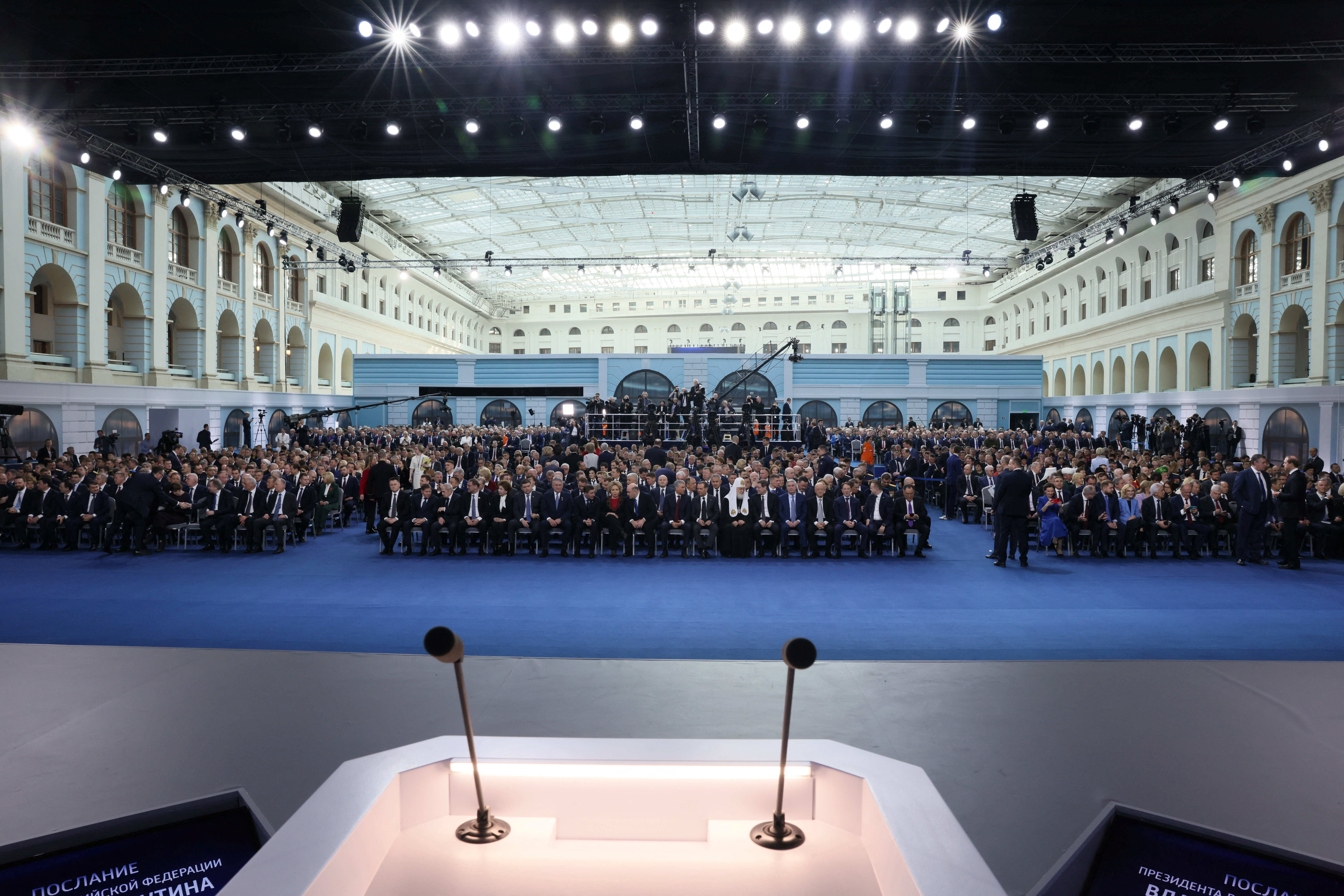 Attendees at Putin's speech (Sputnik/Reuters)