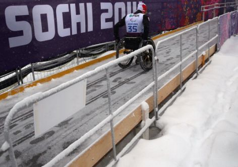 SOCHI, RUSSIA - MARCH 12:  An athlete goes up a ramp in the snow during day five of Sochi 2014 Paralympic Winter Games at Laura Cross-country Ski & Biathlon Center on March 12, 2014 in Sochi, Russia.  (Photo by Ronald Martinez/Getty Images)