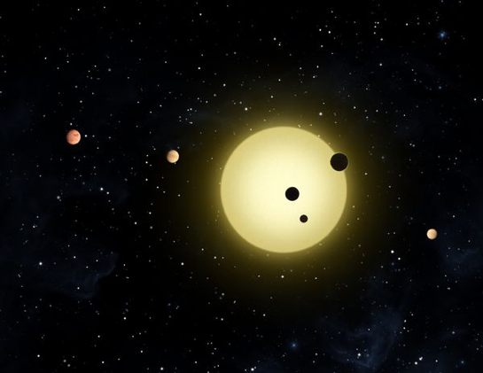 Representación artística de Kepler-11, una estrella pequeña y fría alrededor de la cual orbitan seis planetas. (foto: NASA/Tim Pyle