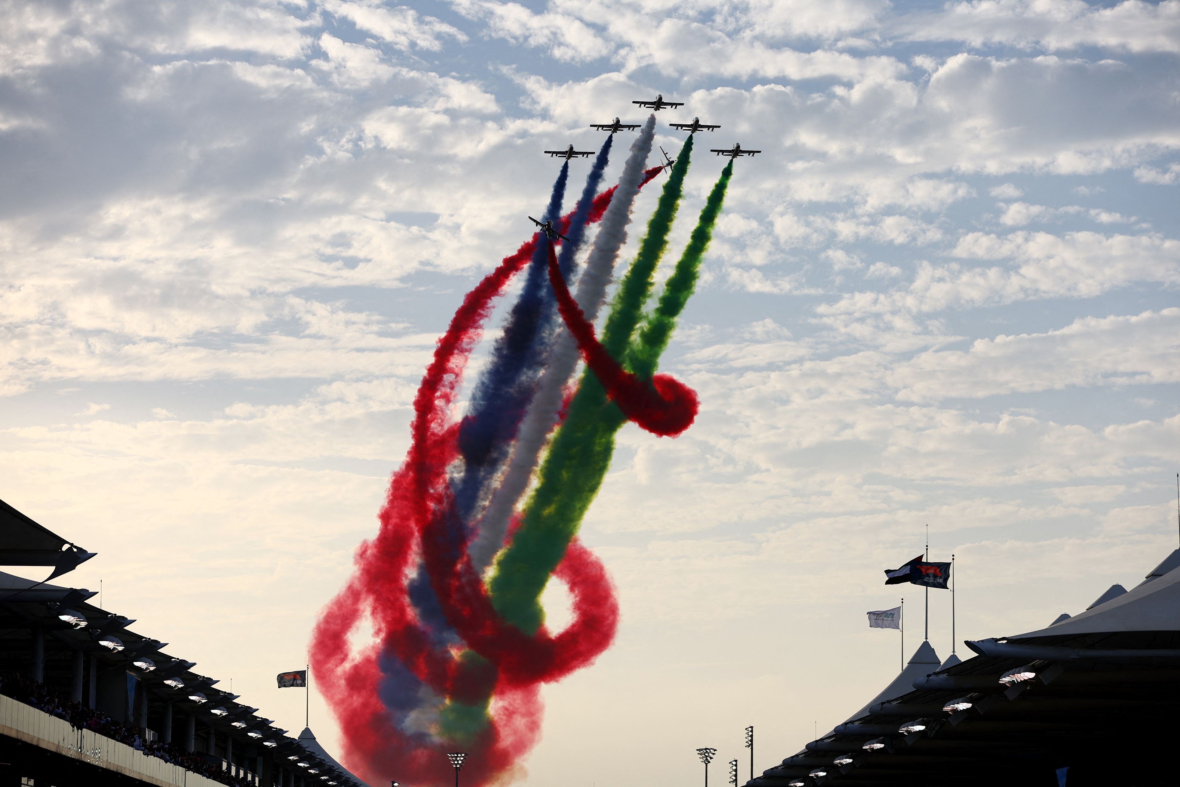 Soccer Football - FIFA World Cup Qatar 2022 - Group A - Qatar v Ecuador - Al Bayt Stadium, Al Khor, Qatar - November 20, 2022 An air display is pictured outside the stadium before the match REUTERS/Rula Rouhana