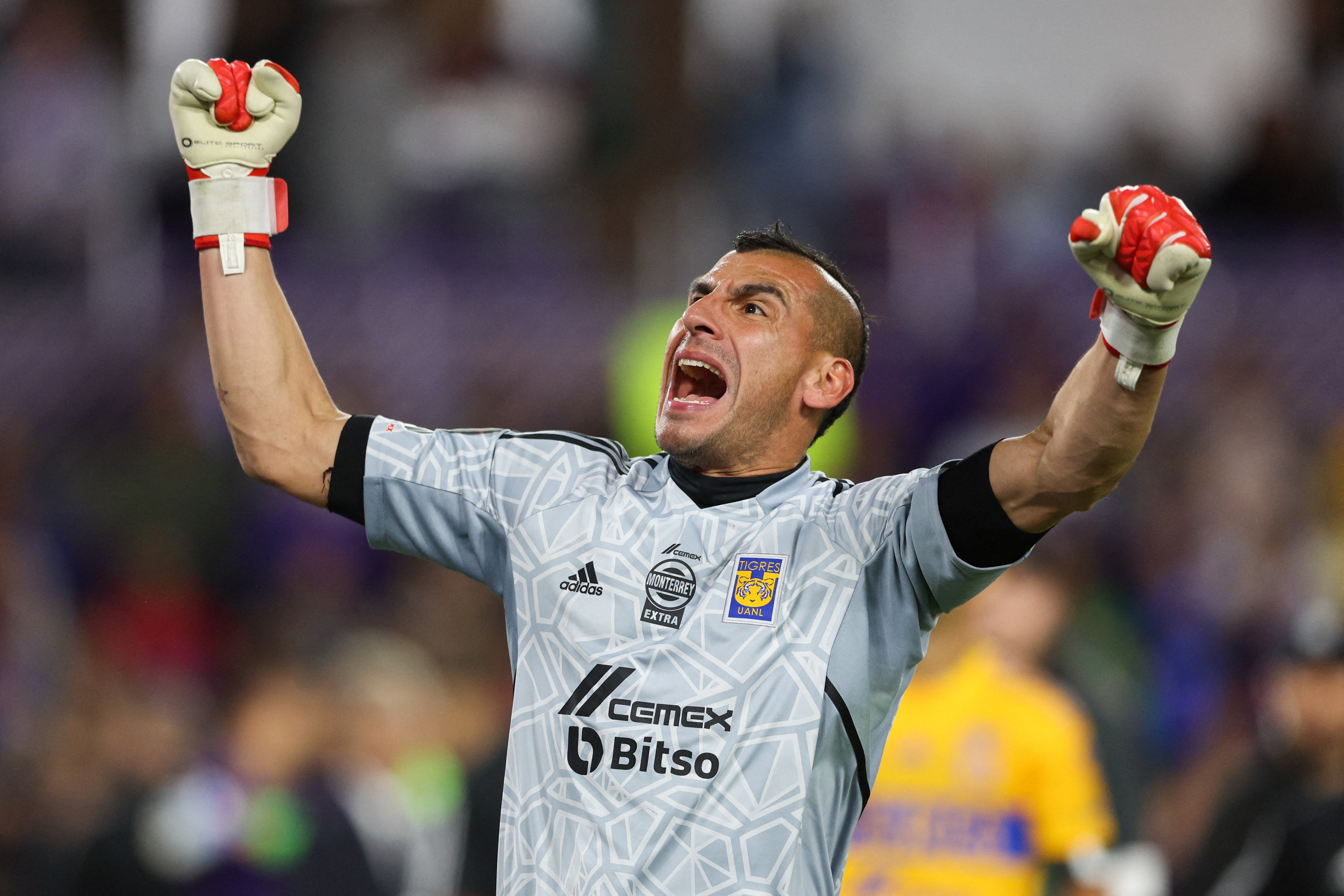 Mar 15, 2023; Orlando, FL, USA;   Tigres UANL goalkeeper Nahuel Guzman (1) celebrates after drawing Orlando City SC to move on to the next round during the CONCACAF Champions League at Exploria Stadium. Mandatory Credit: Nathan Ray Seebeck-USA TODAY Sports