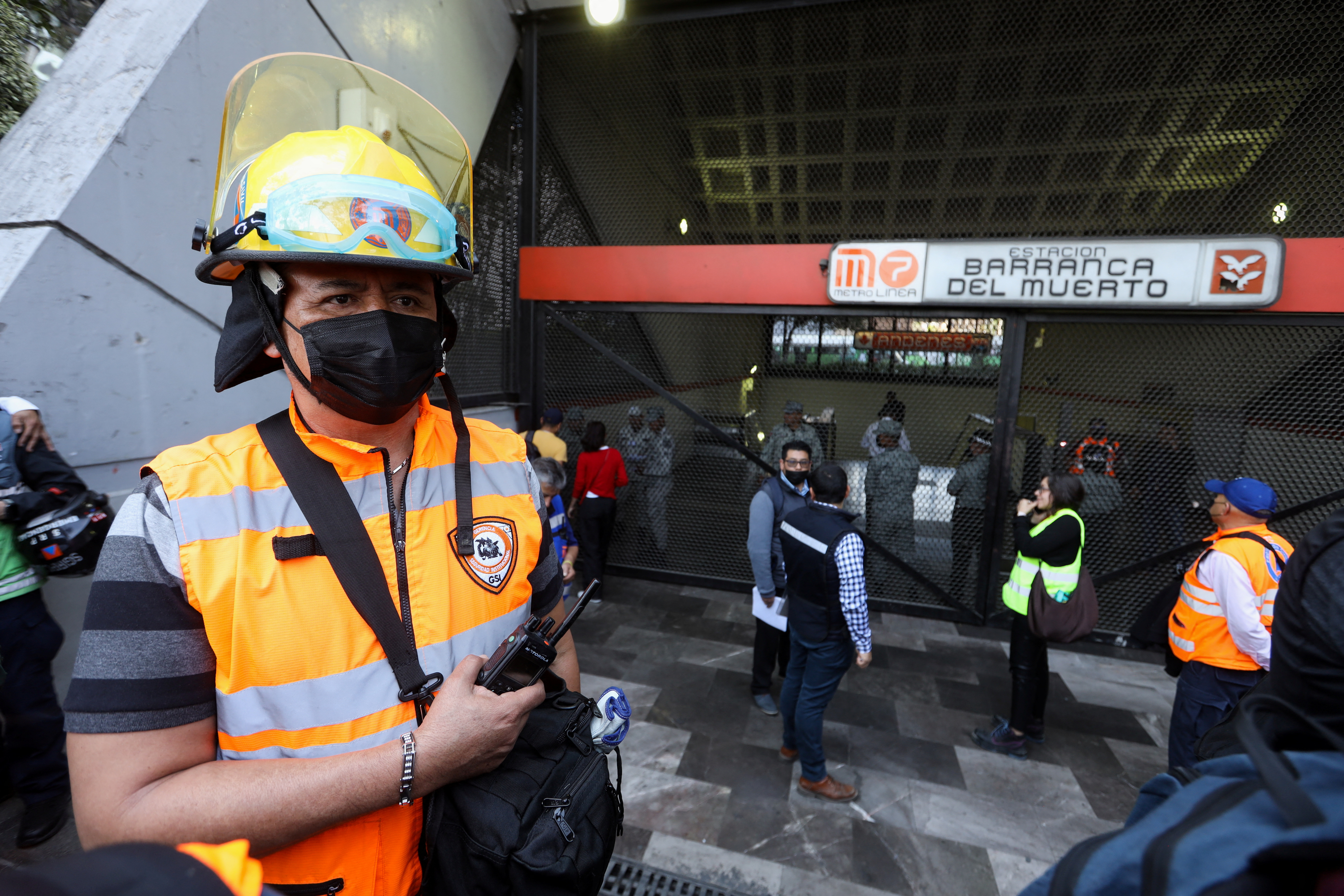 Firefighters and rescue personnel attend an emergency following a fire caused by a short circuit at the Barranca del Muerto metro station, in Mexico City, Mexico January 23, 2023. REUTERS/Luis Cortes