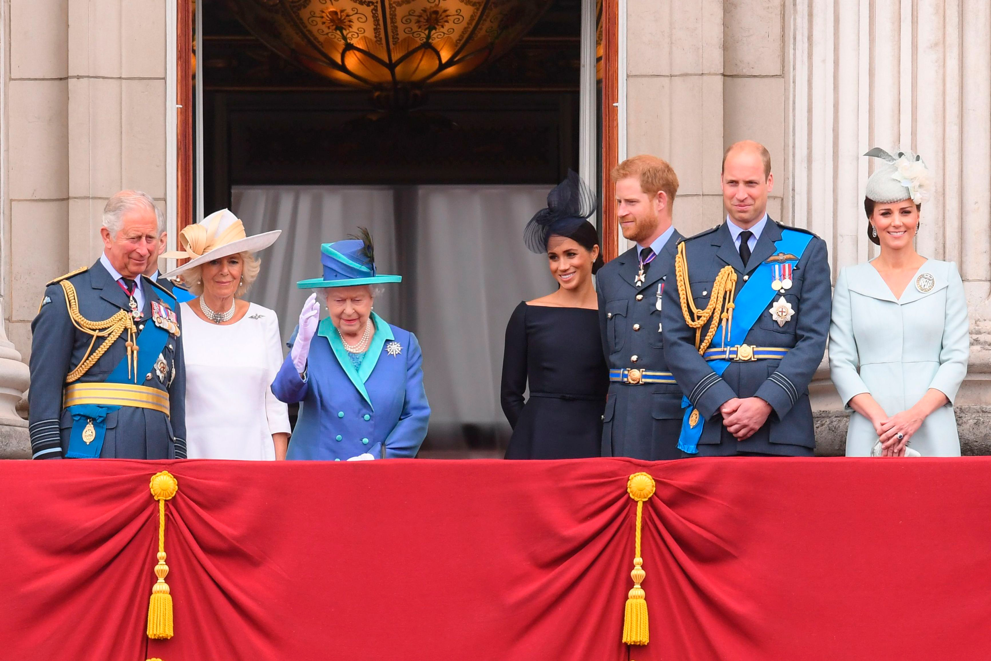Charles, Camilla, Queen Elizabeth II, Meghan, Prince Harry, Prince William and Kate (David Fisher/Shutterstock)