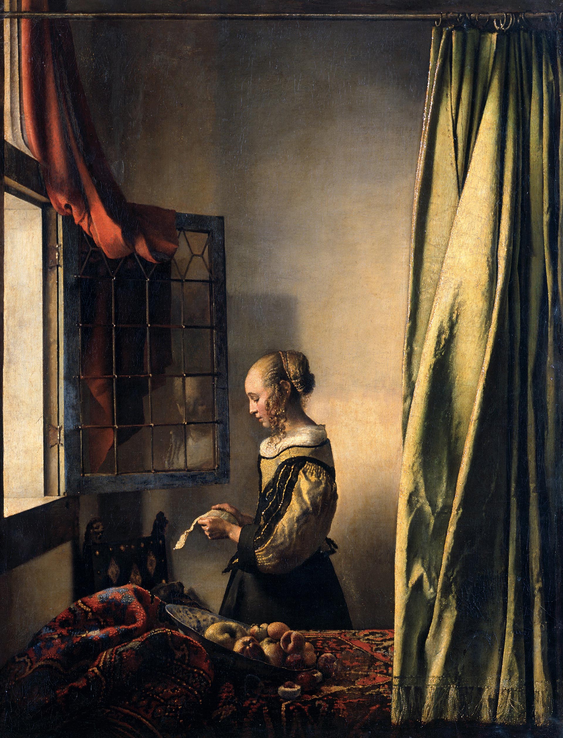 "Muchacha leyendo una carta" (Vermeer, 1657)