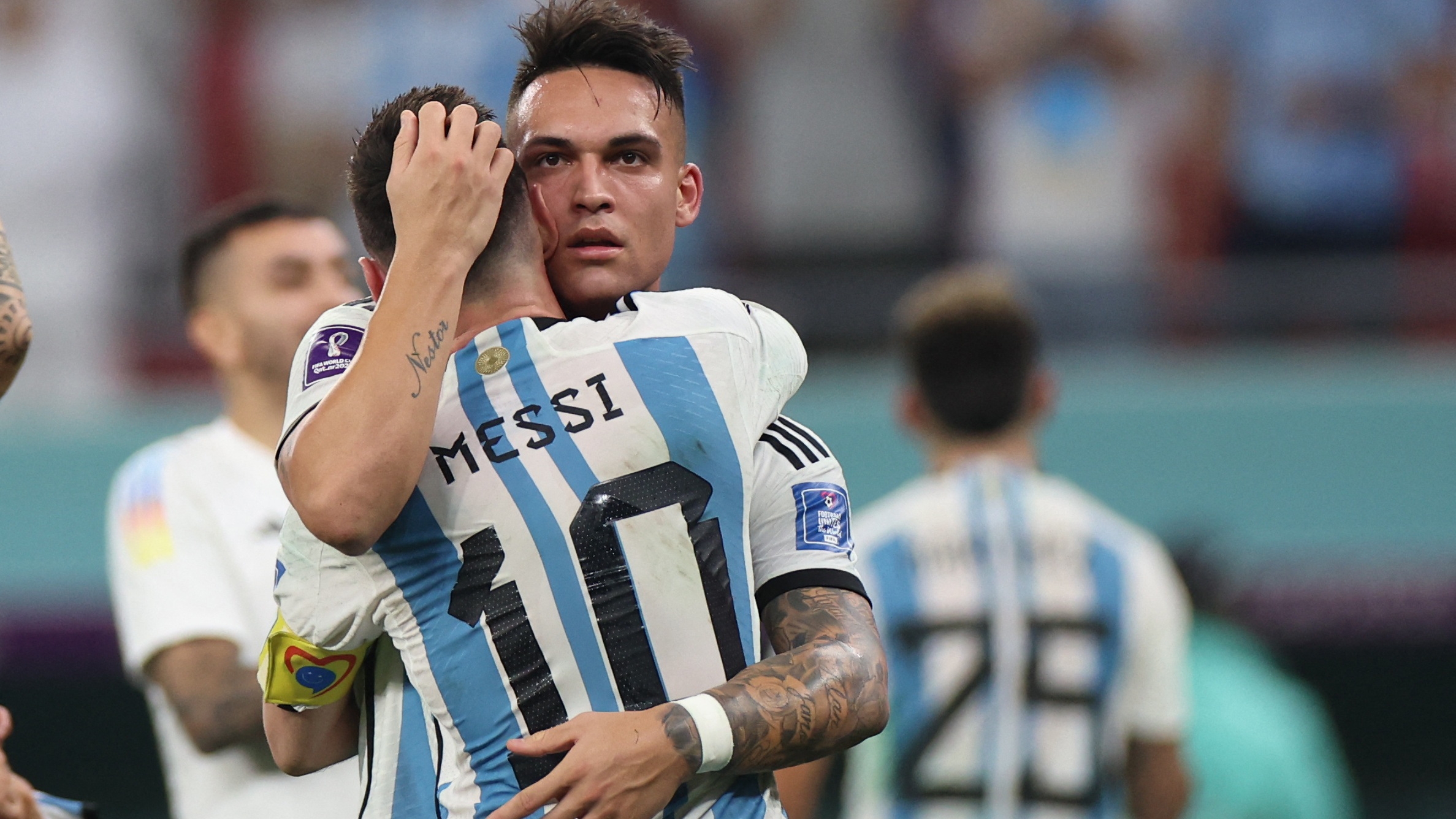 Soccer Football - FIFA World Cup Qatar 2022 - Round of 16 - Argentina v Australia - Ahmad bin Ali Stadium, Al Rayyan, Qatar - December 3, 2022 Argentina's Lionel Messi and Lautaro Martinez celebrate after the match as Argentina progress to the quarter finals REUTERS/Pedro Nunes