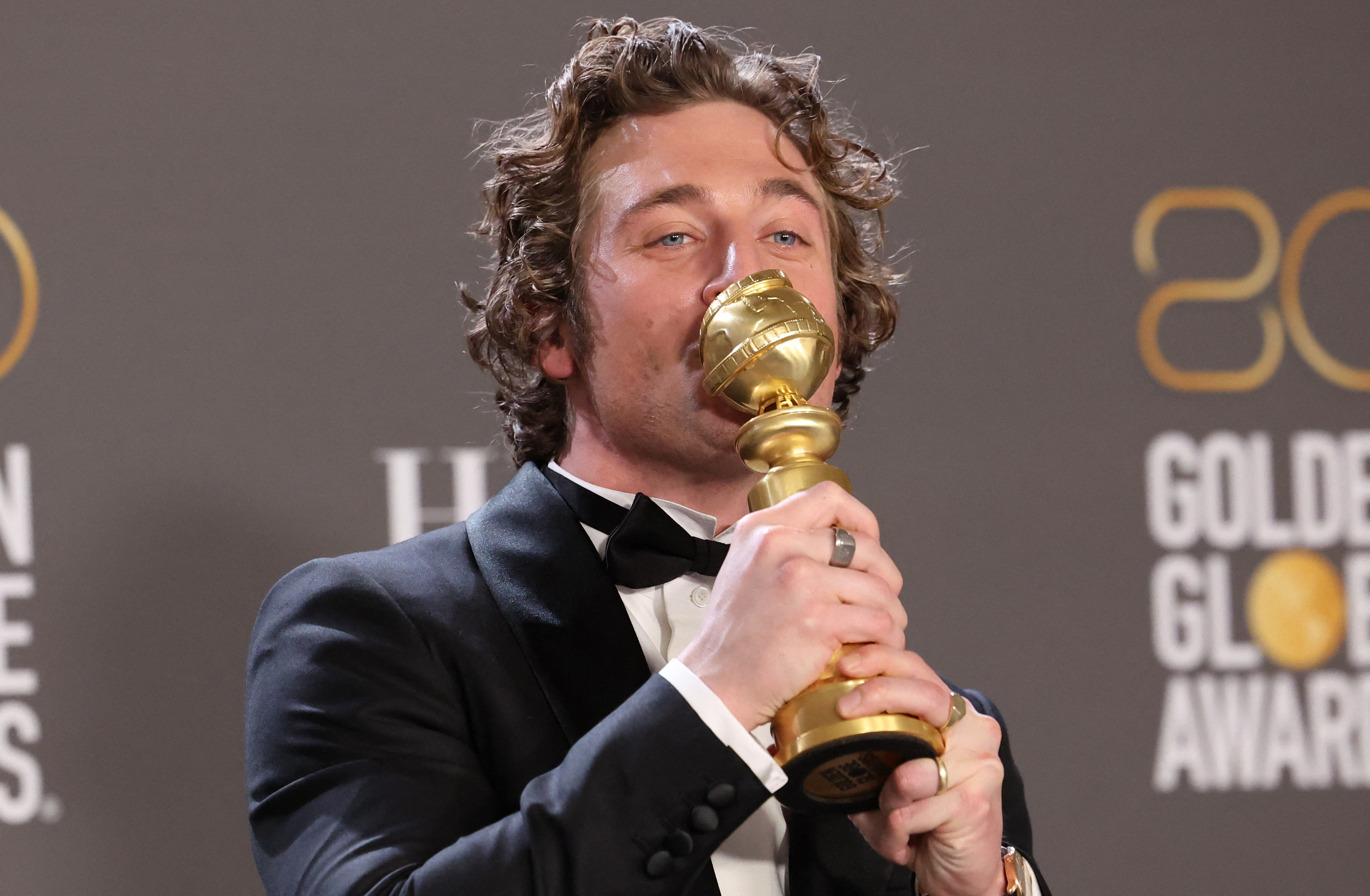 Jeremy Allen White poses with his award for Best Actor in a Musical or Comedy TV series for "The Bear" at the 80th Annual Golden Globe Awards in Beverly Hills, California, U.S., January 10, 2023. REUTERS/Mario Anzuoni