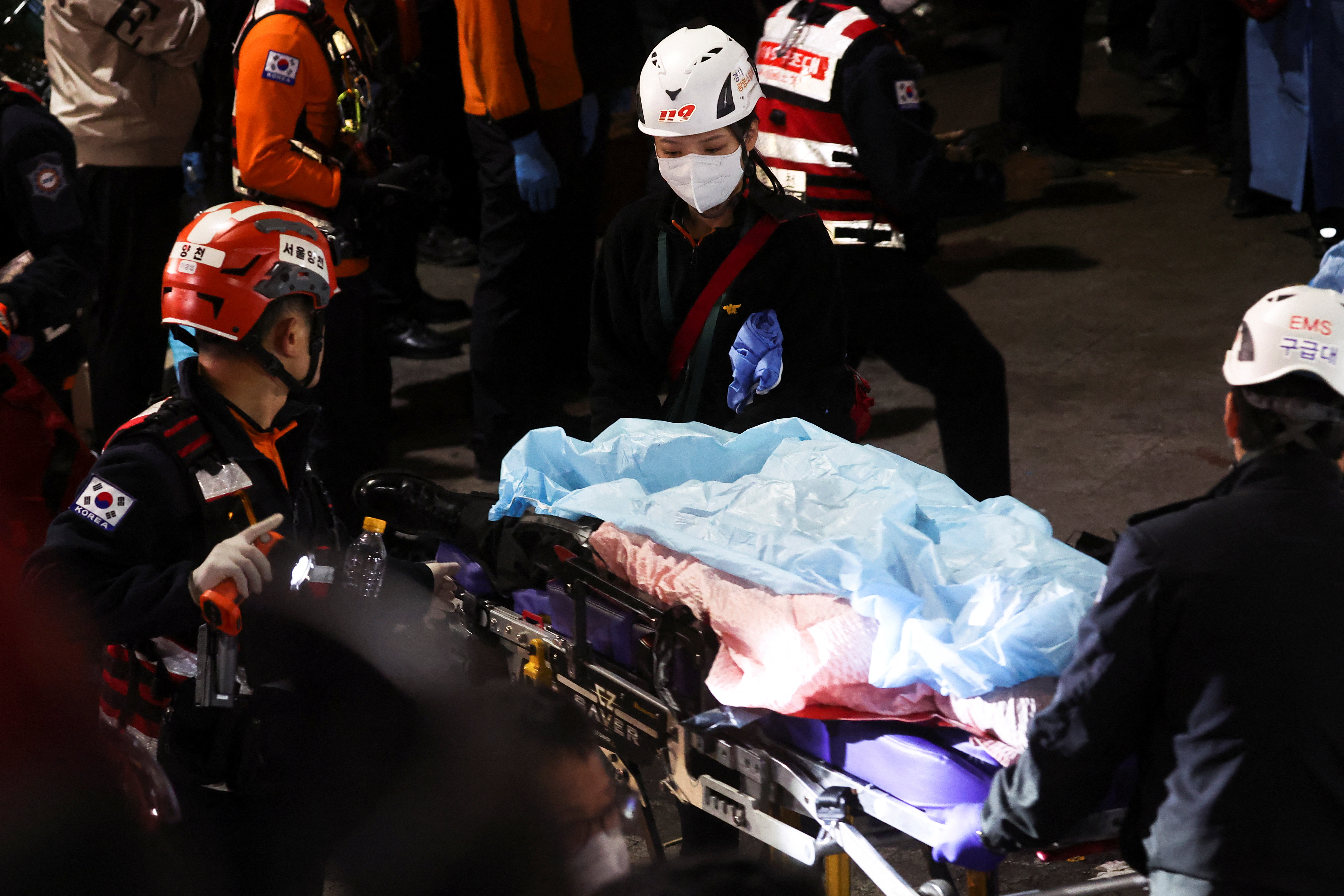 Television footage and photos from the scene showed ambulance vehicles lining the streets amid a heavy police presence and emergency workers carrying the injured on stretchers.
