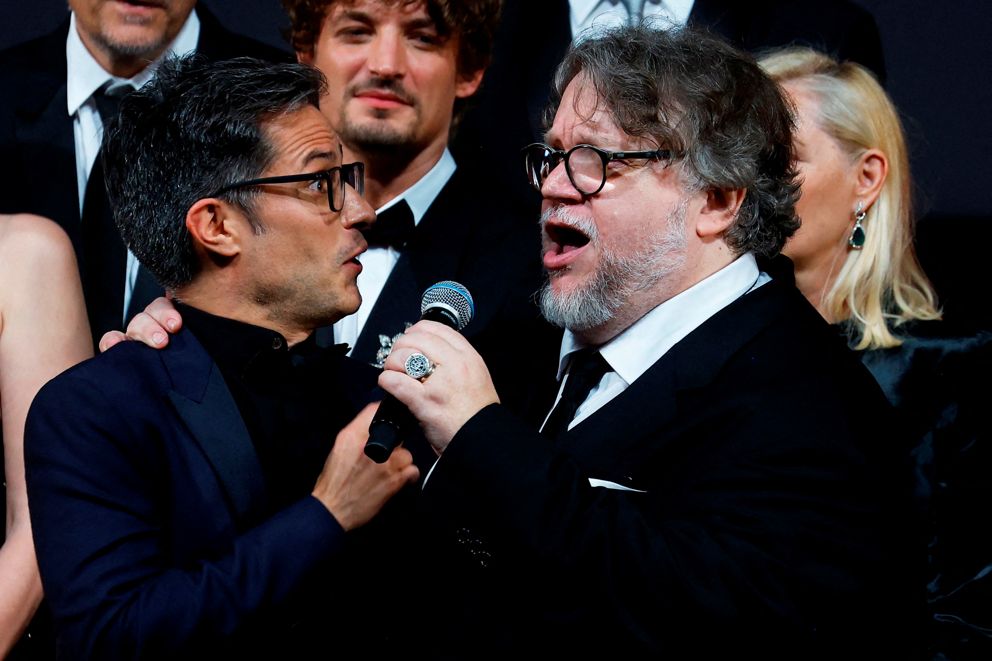 The 75th Cannes Film Festival - Screening of the film "L'innocent" Out of Competition and Anniversary Event - Cannes, France, May 24, 2022. Guillermo del Toro and Gael Garcia Bernal sing. REUTERS/Eric Gaillard TPX IMAGES OF THE DAY