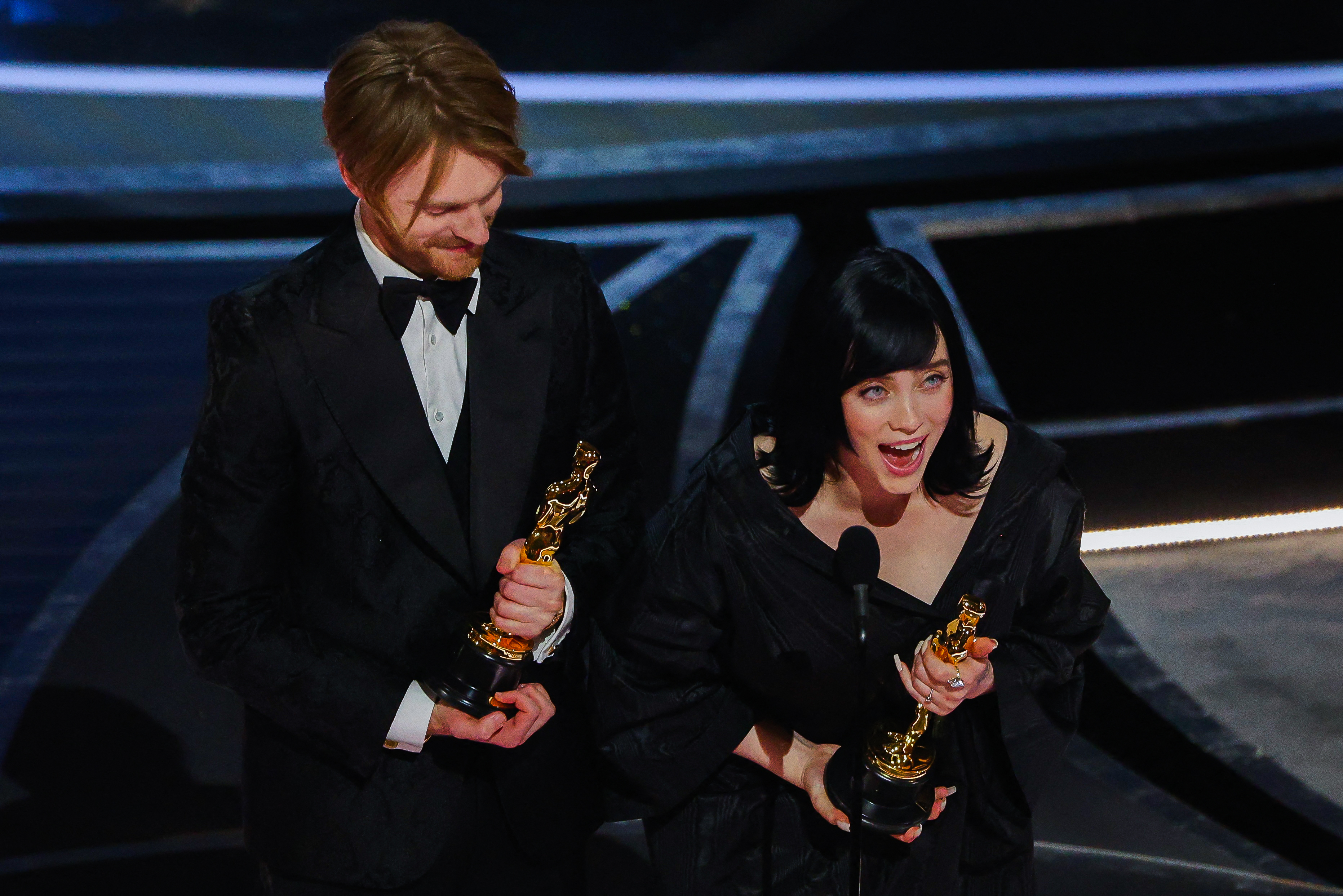 Billie Eilish and Finneas O'Connell win the Oscar for Best Original Song for "No Time to Die" from the James Bond film at the 94th Academy Awards in Hollywood, Los Angeles, California, US, March 27, 2022. REUTERS/Brian Snyder