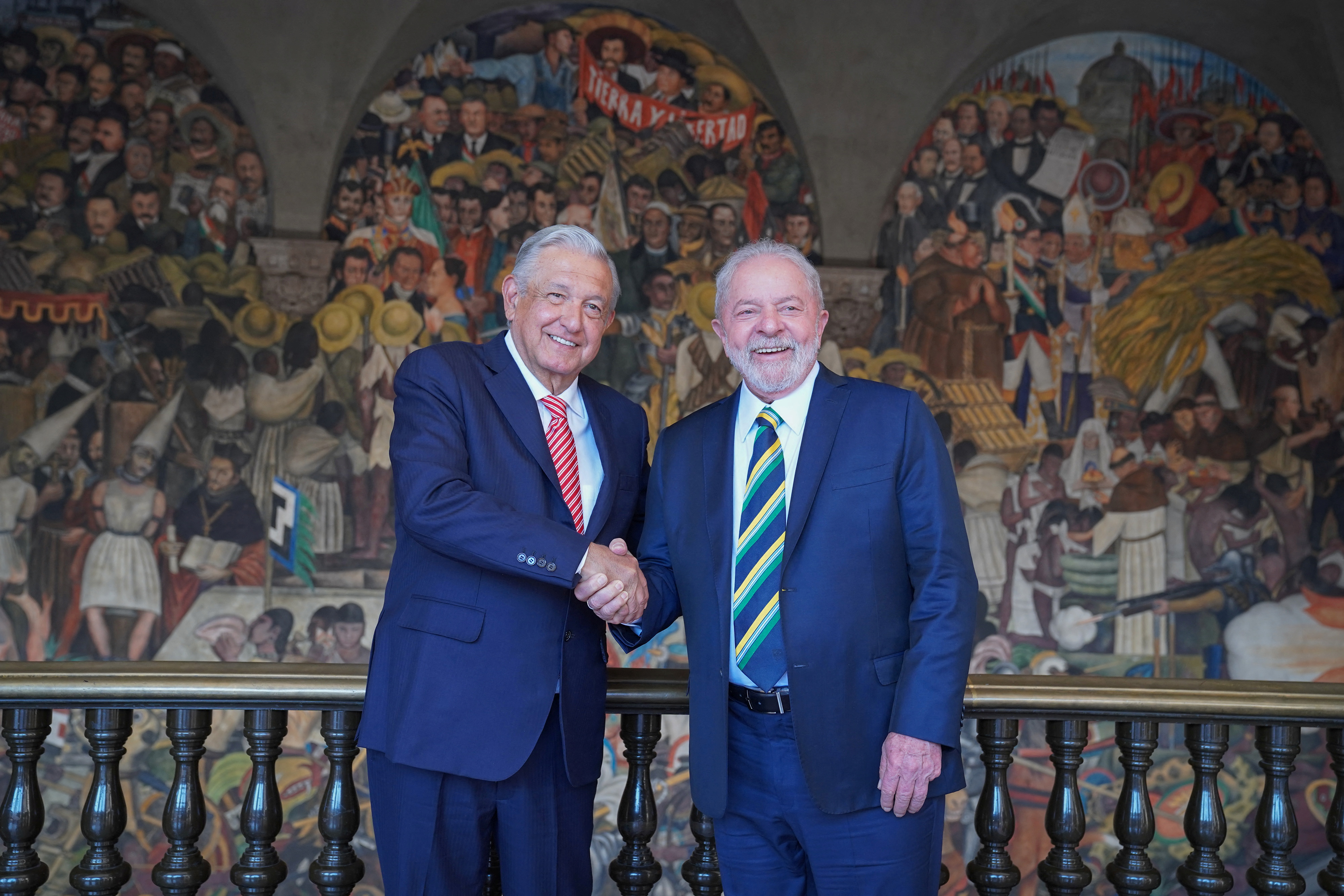 Mexican President Andres Manuel Lopez Obrador shakes hands with Brazil's former President Luiz Inacio Lula da Silva, at the National Palace Mexico City, Mexico March 2, 2022. Mexico Presidency/Handout via REUTERS ATTENTION EDITORS - THIS IMAGE WAS PROVIDED BY A THIRD PARTY. NO RESALES. NO ARCHIVES