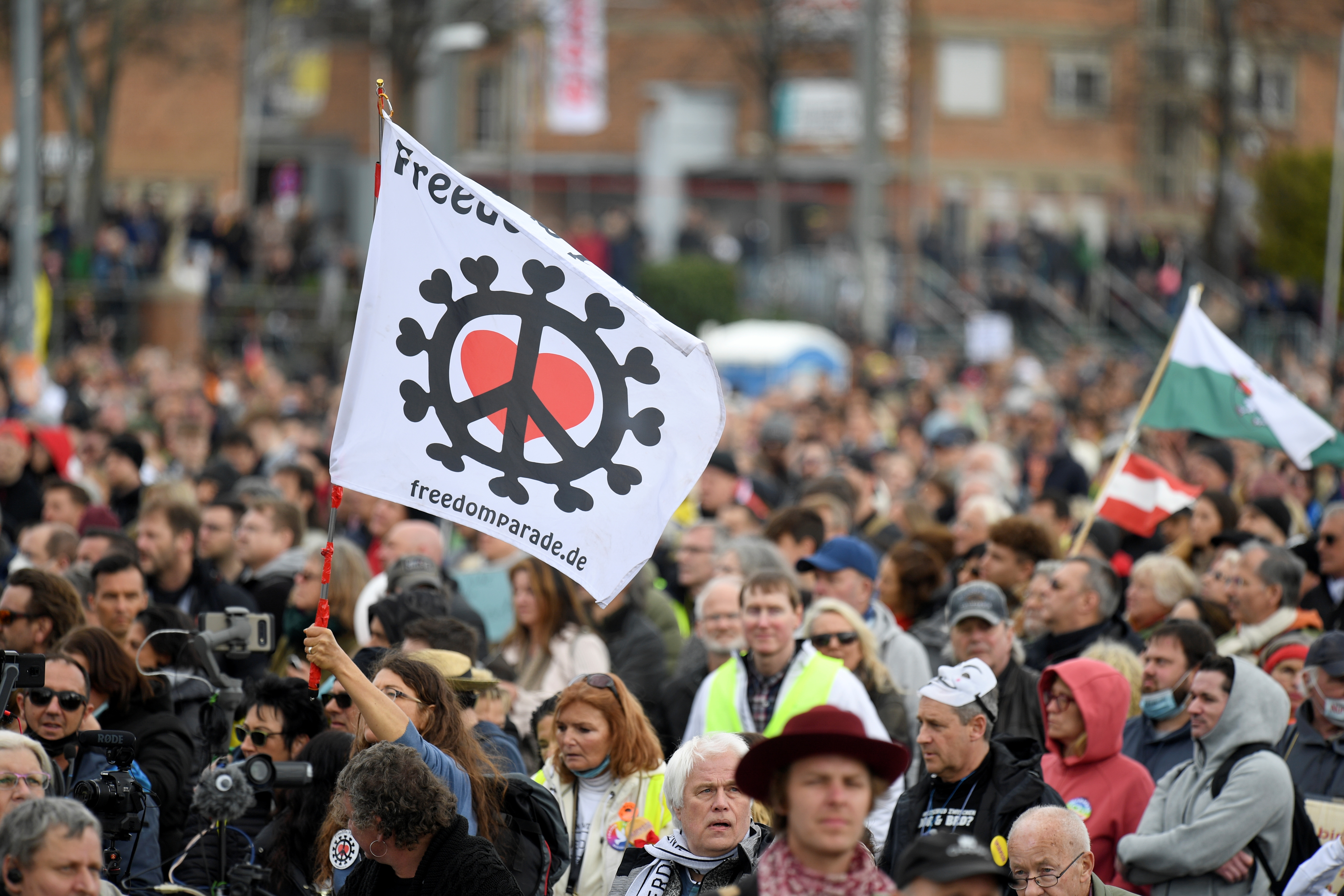 Demonstrators attend a protest against the government's coronavirus disease (COVID-19) restrictions in Stuttgart, Germany, April 3, 2021. REUTERS/Andreas Gebert