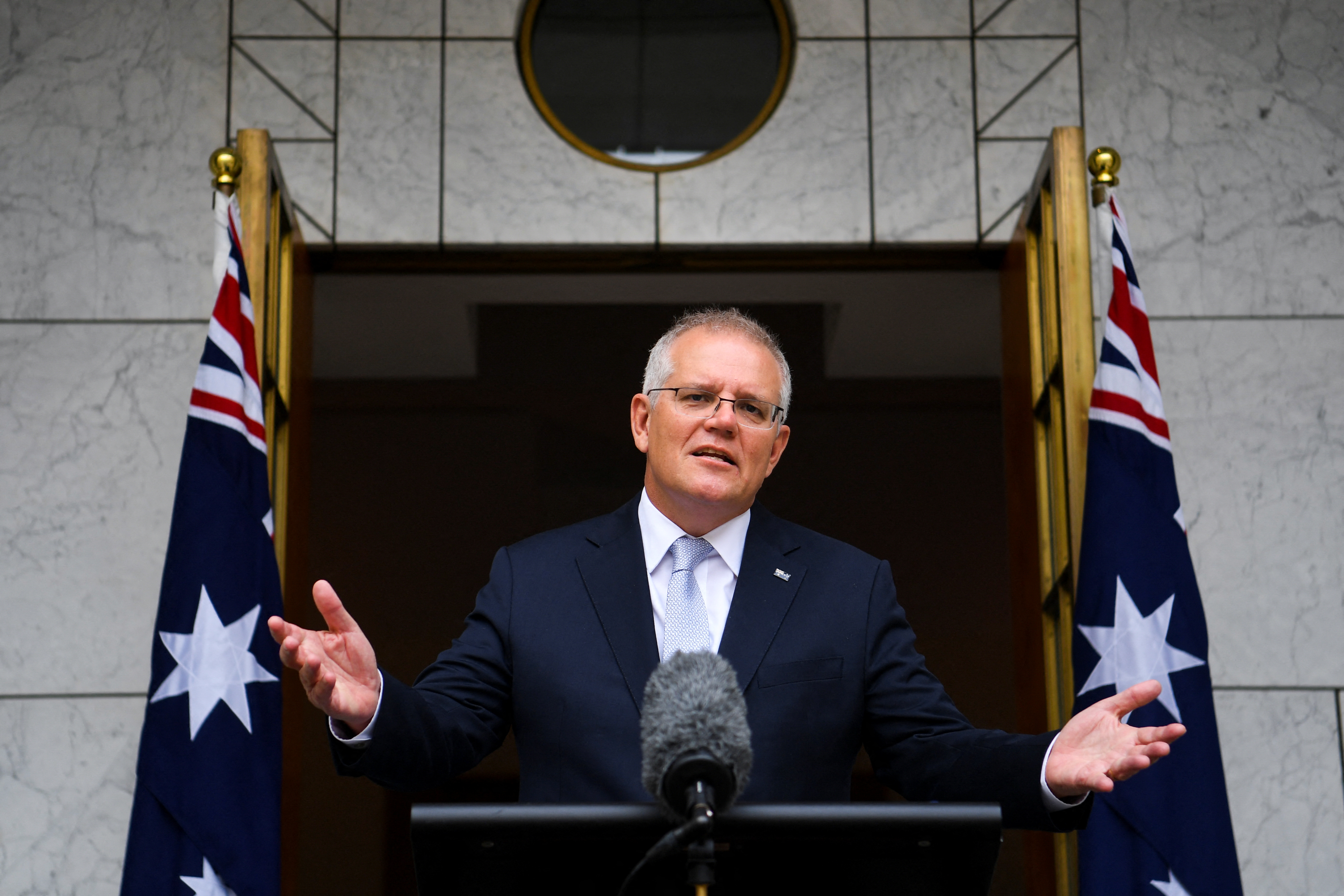 Australian Prime Minister Scott Morrison speaks during a news conference at Parliament House, in Canberra, Australia January 6, 2022. AAP Image/Lukas Coch via REUTERS  ATTENTION EDITORS - THIS IMAGE WAS PROVIDED BY A THIRD PARTY. NO RESALES. NO ARCHIVE. AUSTRALIA OUT. NEW ZEALAND OUT