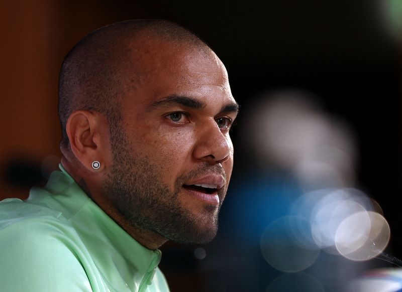 FILE PHOTO: Brazilian soccer player Dani Alves during a news conference in Doha, Qatar, December 1, 2022. REUTERS/Pedro Nunes