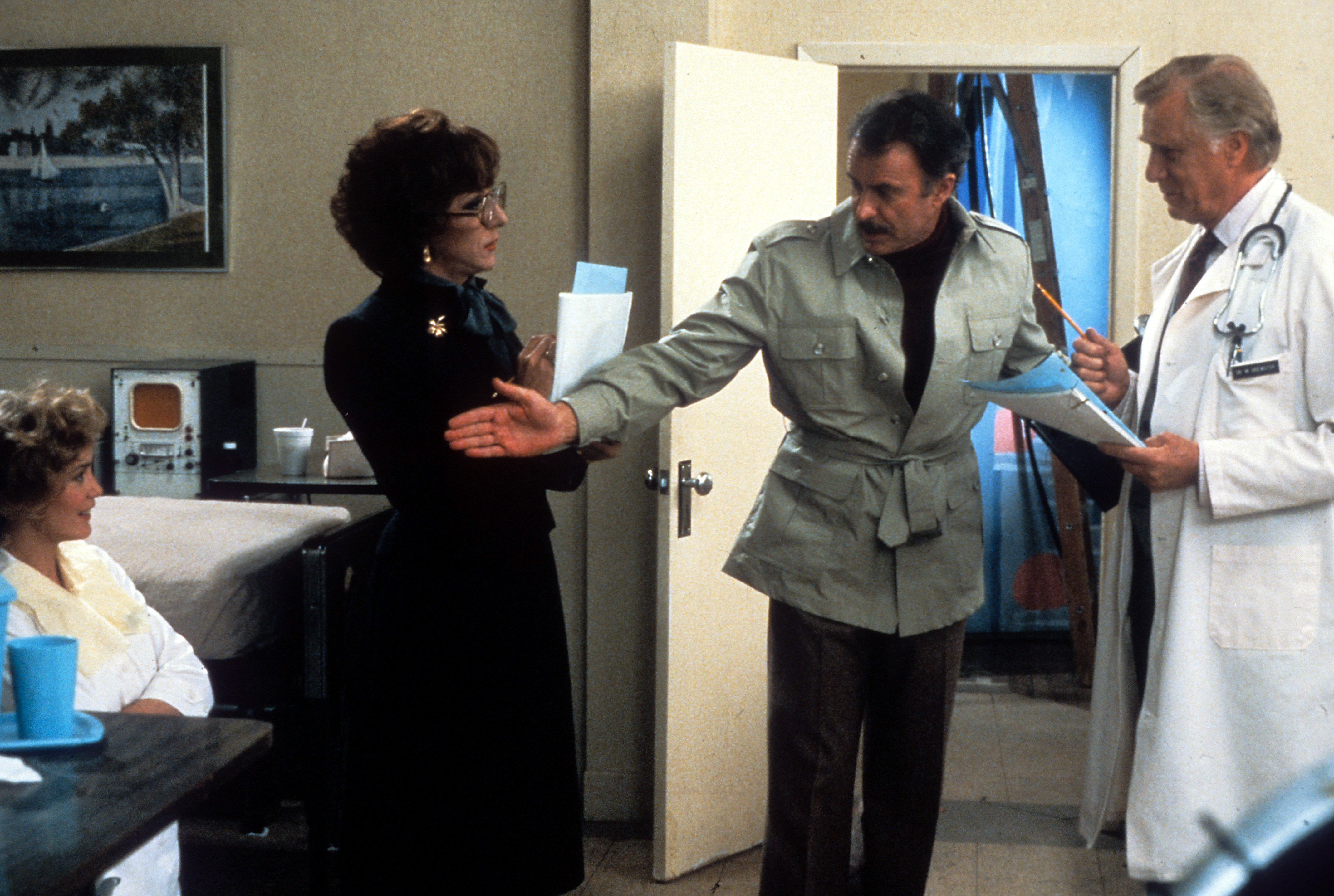 Jessica Lange and Dustin Hoffman looks to Dabney Coleman in a scene from the film 'Tootsie', 1982. (Photo by Columbia Pictures/Getty Images)