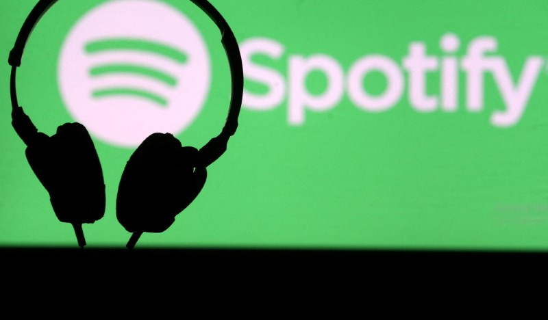 Illustrative file photo of headphones in front of the Spotify logo April 1, 2018. REUTERS/Dado Ruvic/