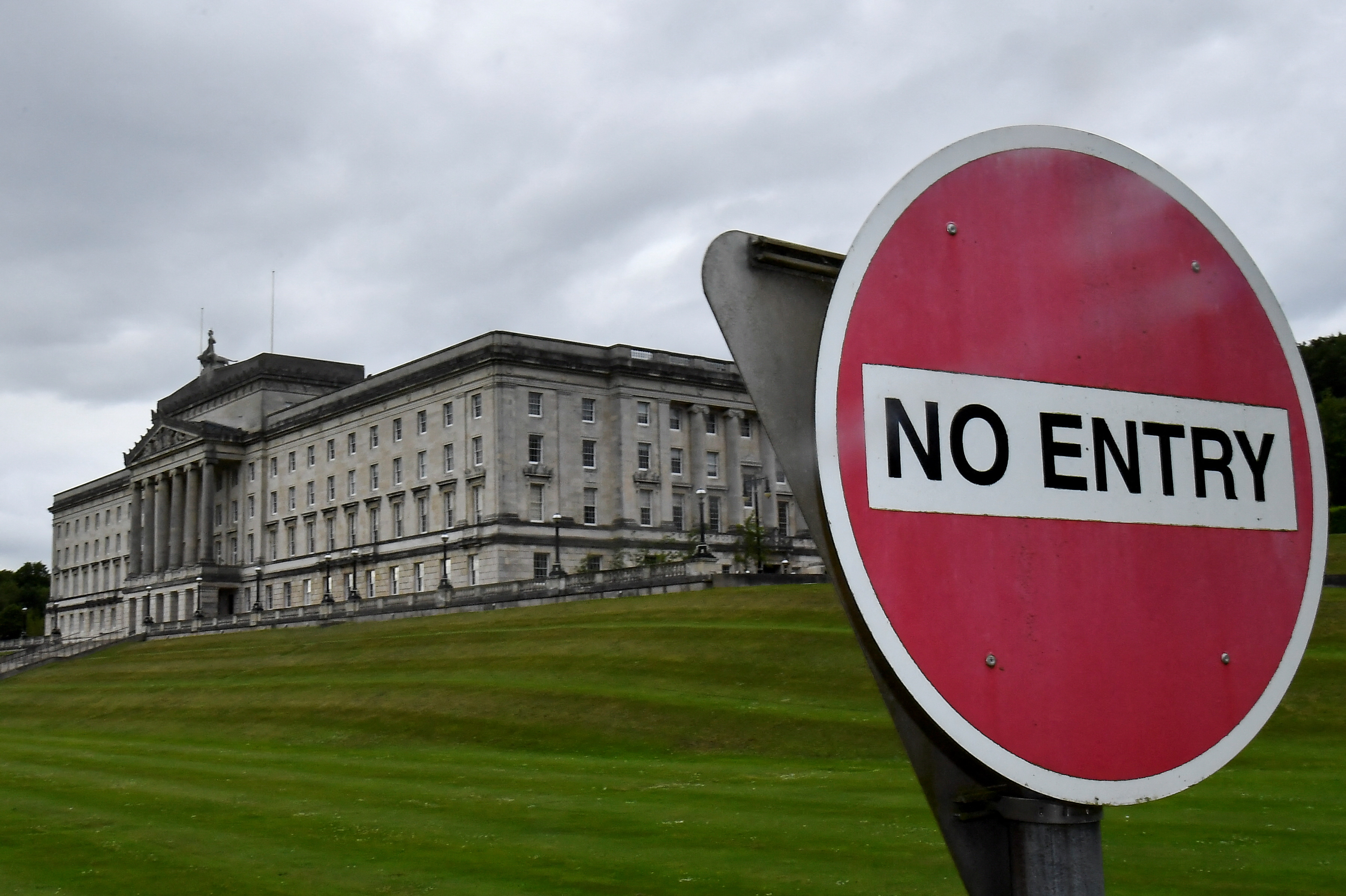 A 'no entry' sign is seen near the Stormont Parliament Buildings on the day Britain is expected to publish a bill to unilaterally scrap some of the rules governing post-Brexit trade with Northern Ireland, as its dispute with the European Union over the protocol has not yet been resolved, in Belfast, Northern Ireland June 13, 2022. REUTERS/Clodagh Kilcoyne