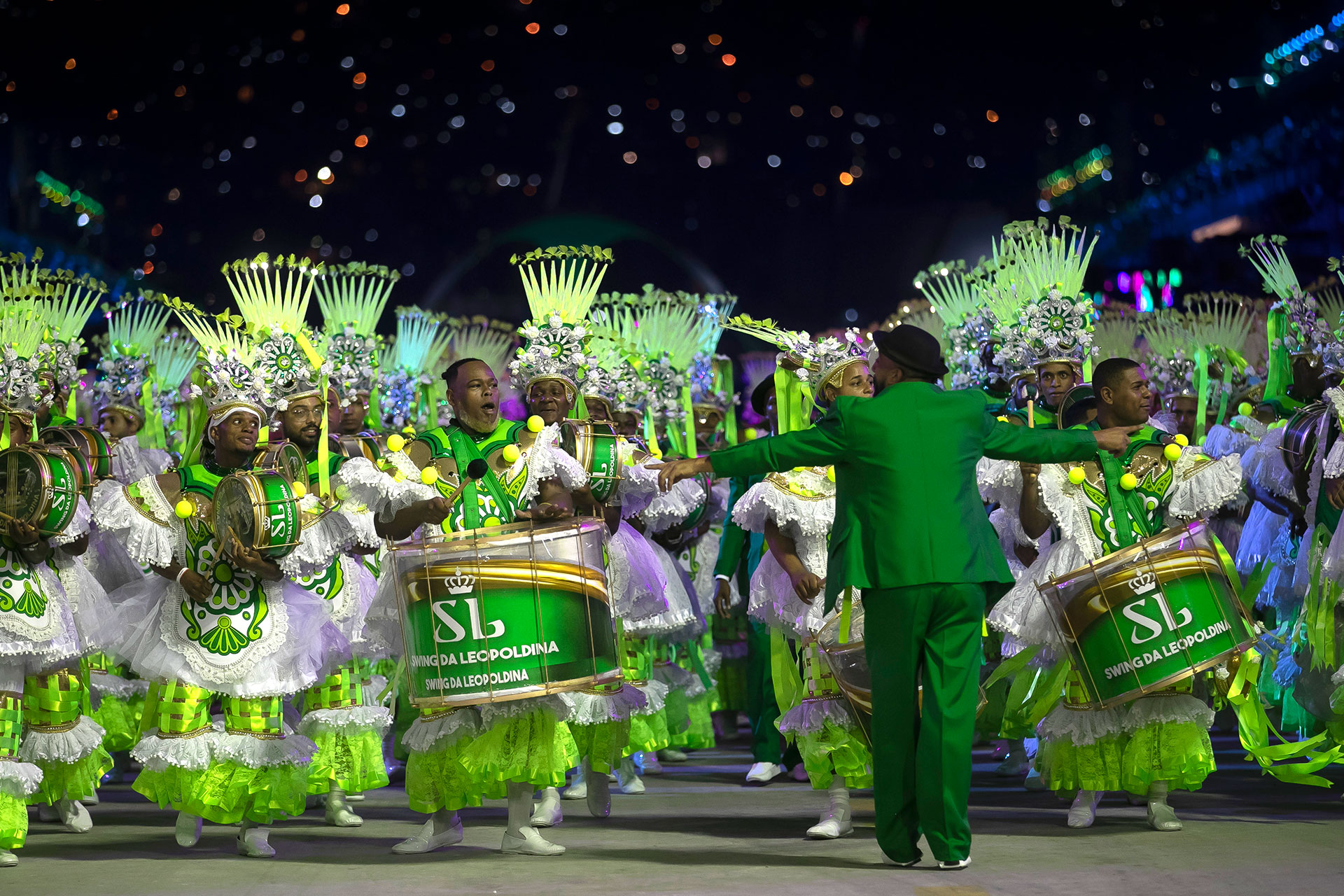 Artists from the Imperatriz Leopoldinense samba school parade on a float during Carnival celebrations