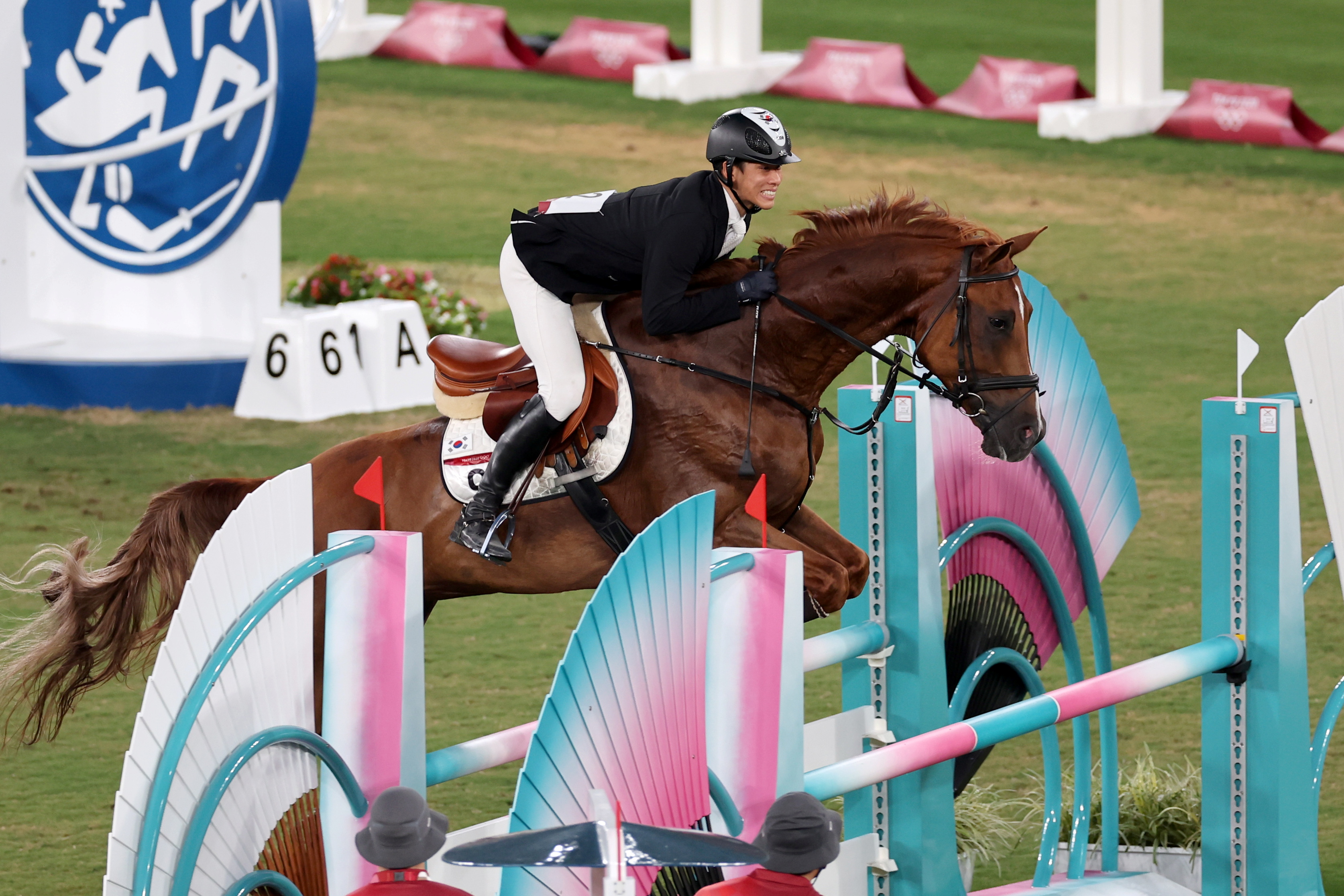 FILE PHOTO: Tokyo 2020 Olympics - Modern Pentathlon - Men's Riding - Tokyo Stadium - Tokyo, Japan - August 7, 2021. Jung Jin-Hwa of South Korea in action REUTERS/Carlos Barria/File Photo