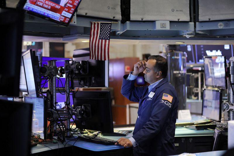 A trader works on the premises of the New York Stock Exchange in Manhattan.