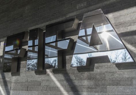 ZURICH, SWITZERLAND - MARCH 18: A FIFA sign at the entrance of its headquarters on March 18, 2016 in Zurich, Switzerland. (Photo by Valeriano Di Domenico/Getty Images)