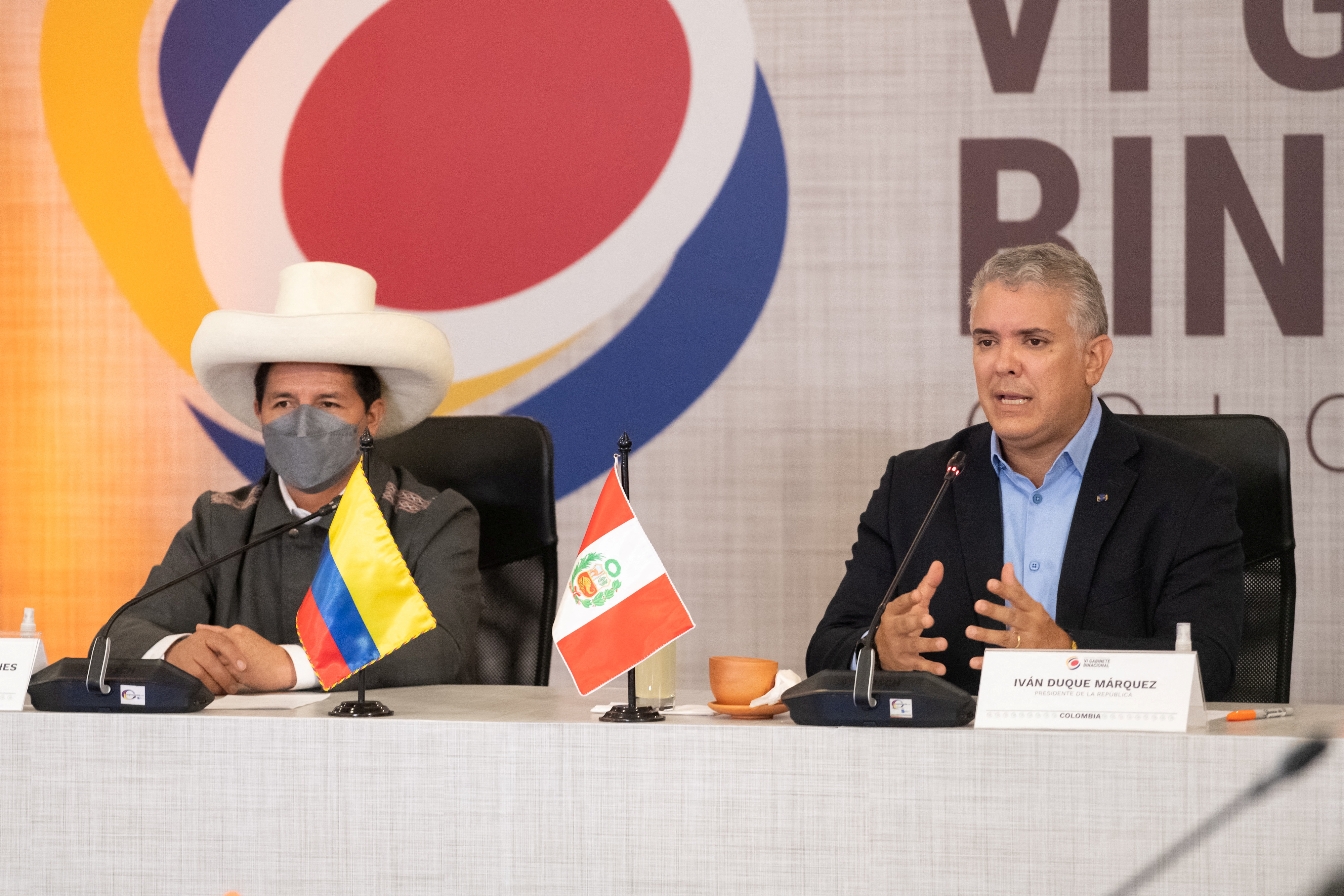Colombian President Ivan Duque speaks accompanied by Peru's President Pedro Castillo during the VI Binational Cabinet in Villa de Leyva, Colombia January 13, 2022. Courtesy of Colombian Presidency/Handout via REUTERS ATTENTION EDITORS - THIS IMAGE WAS PROVIDED BY A THIRD PARTY. NO RESALES. NO ARCHIVES. MANDATORY CREDIT
