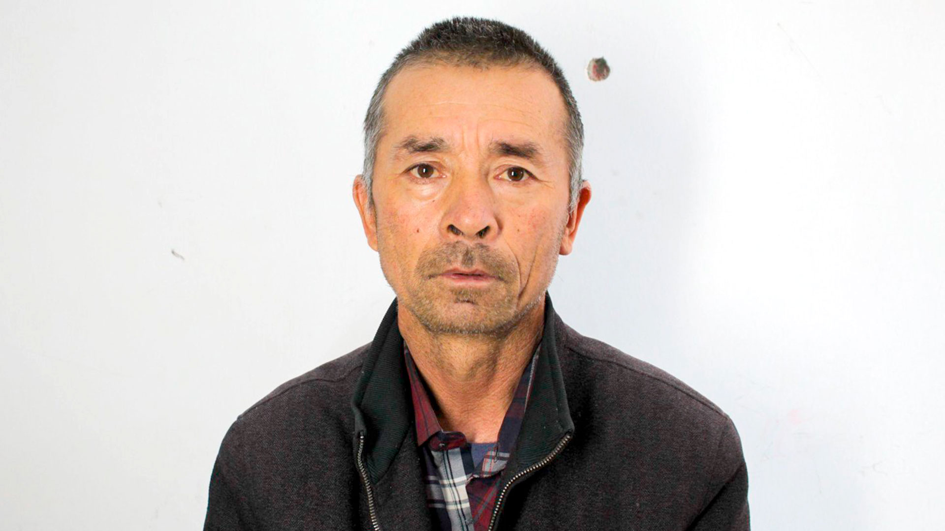 Foto de uno de los uigures detenidos (Archivos de la Policía de Xinjiang/Victims of Communism Memorial Foundation.)