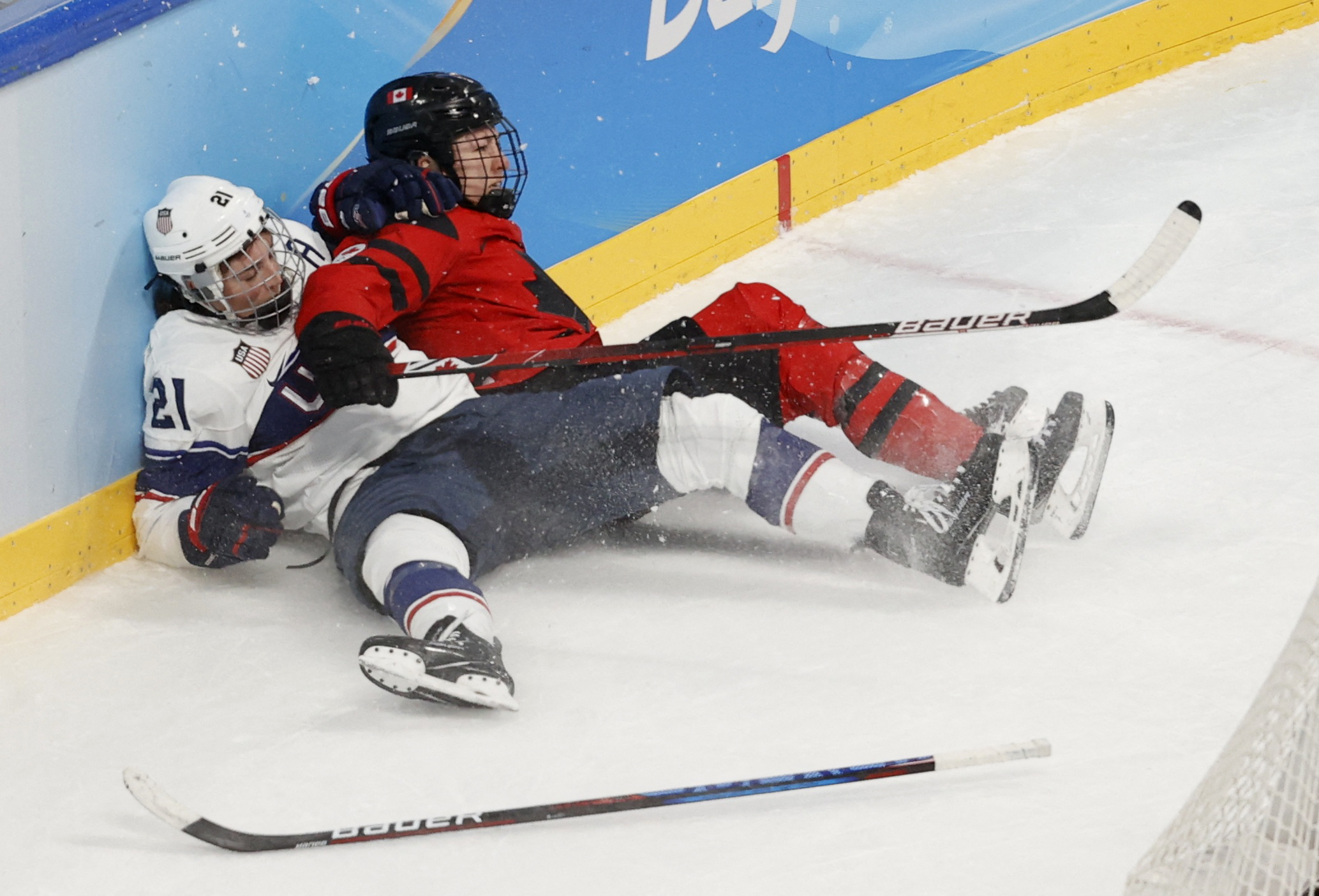 DAY #13 SPORTS FOCUS: Tough day at the office for U.S. athletes as women’s hockey team falters to Canada and Shiffrin stumbles in combined slalom