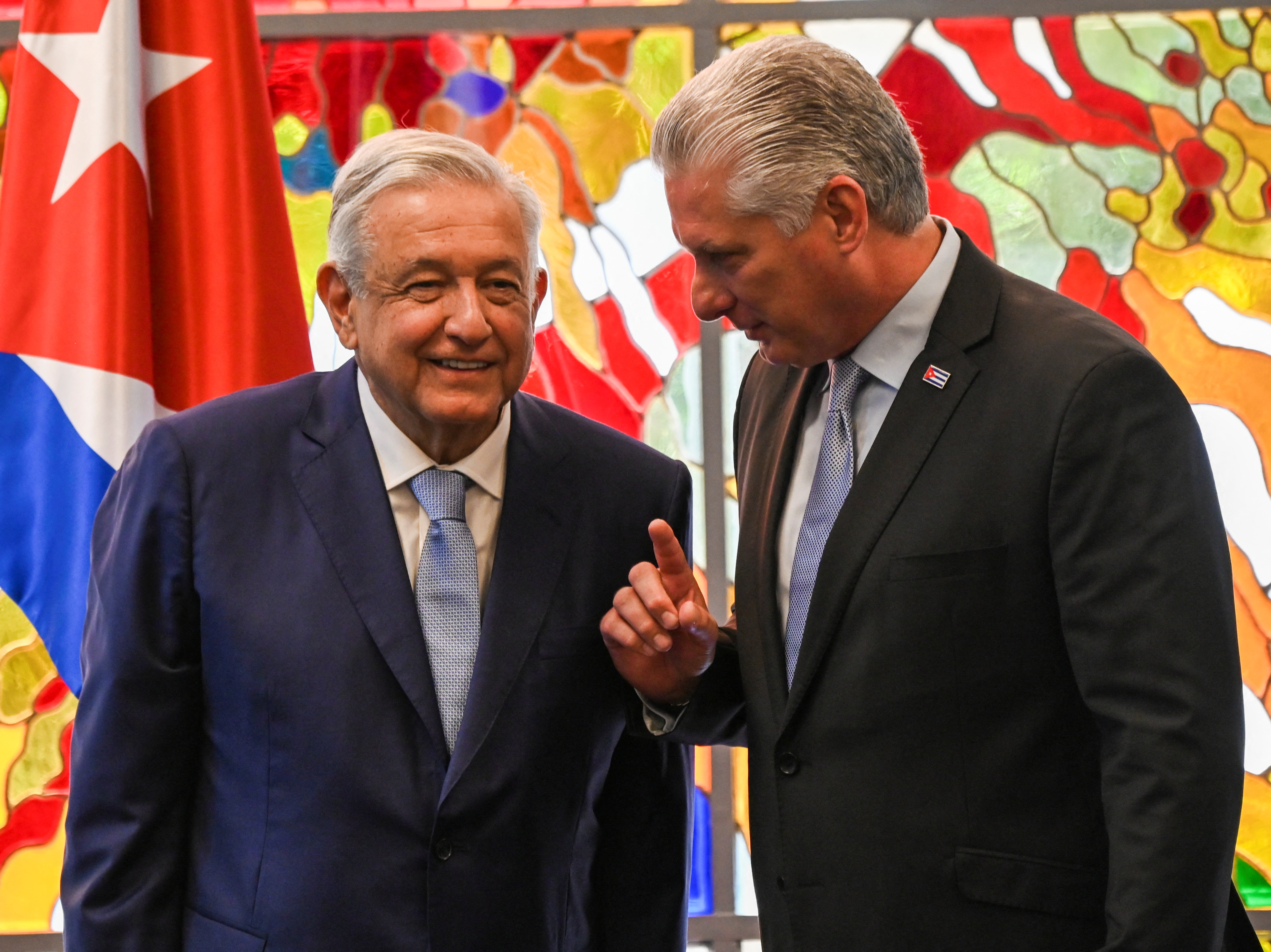 Mexico's President Andres Manuel Lopez Obrador and Cuba's President Miguel Diaz-Canel chat at the Revolution Palace in Havana, Cuba, May 8, 2022. Yamil Lage/Pool via REUTERS
