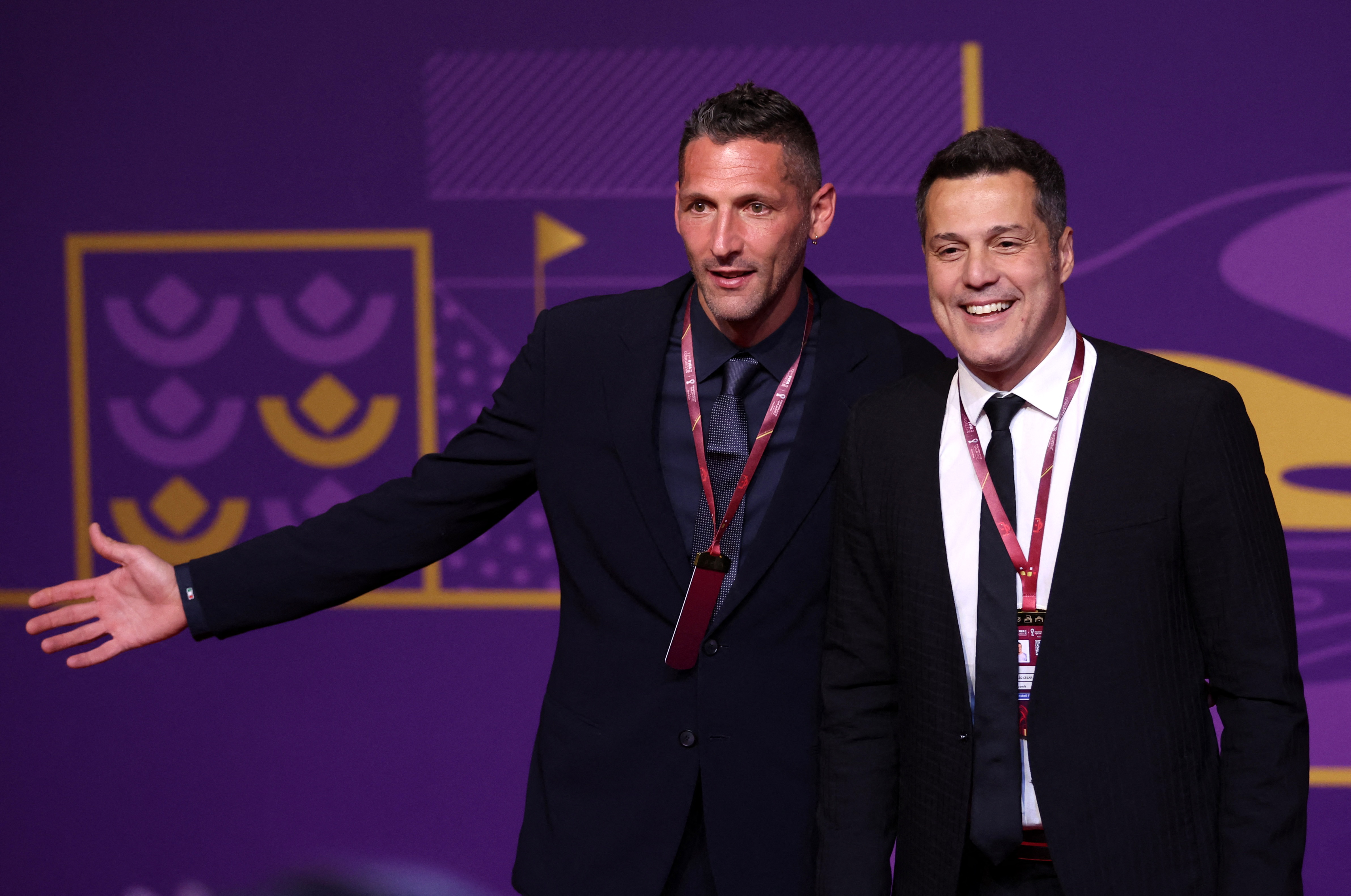 Soccer Football - World Cup - Final Draw - Doha Exhibition & Convention Center, Doha, Qatar - April 1, 2022 Former player Julio Cesar and Marco Materazzi arrive ahead of the draw REUTERS/Carl Recine