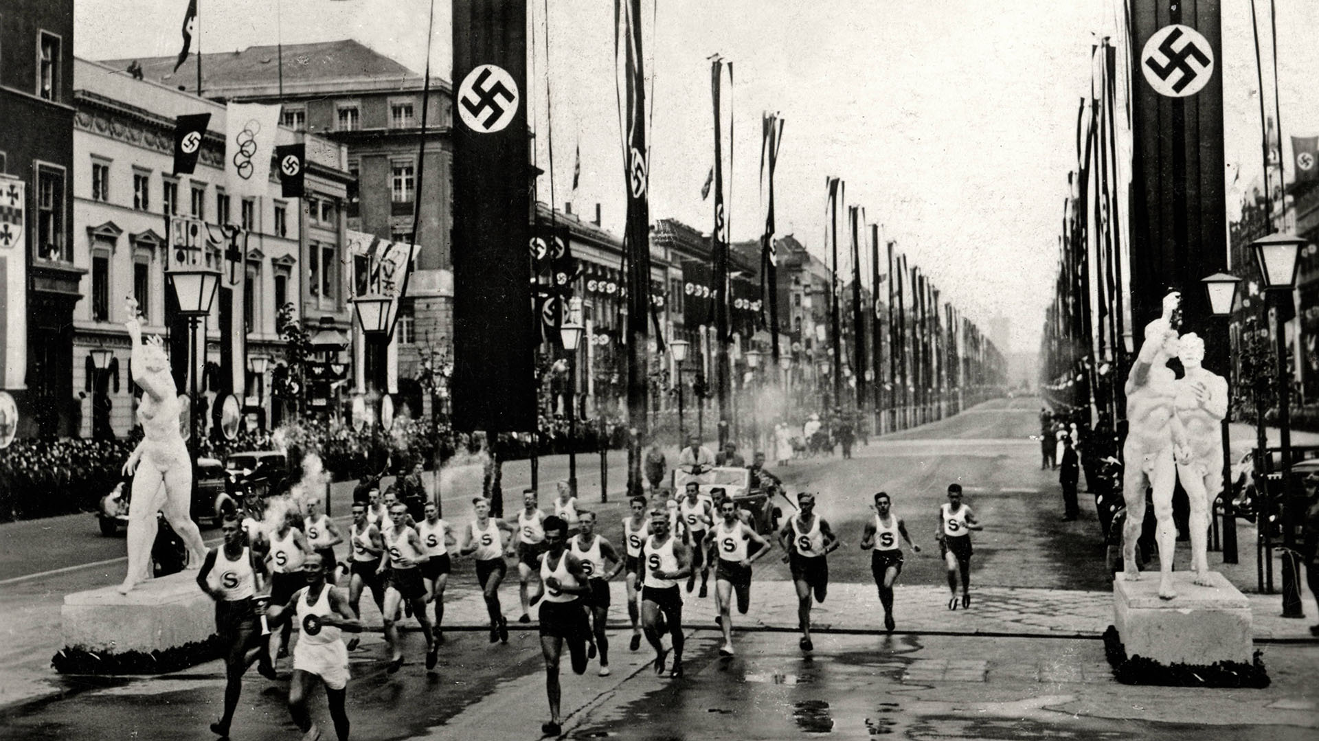 Mandatory Credit: Photo by Cci/Shutterstock (6044433v) The Olympic Flame carried into Berlin, at the beginning of the Olympic Games of 1936, Berlin.  Photograph, Germany, 1936 Art (Sport) - various