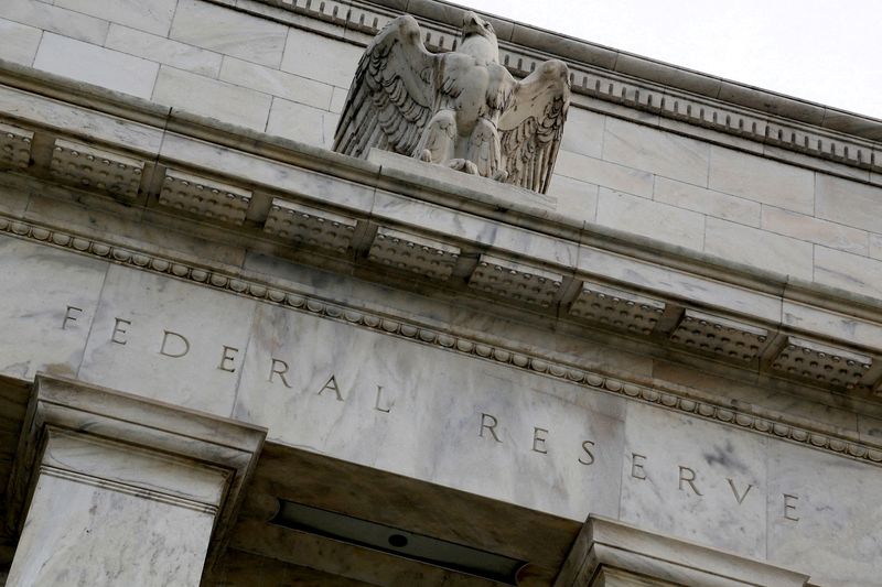 An eagle tops the facade of the United States Federal Reserve Building in Washington, USA.  July 31, 2013. REUTERS/Jonathan Ernst/File