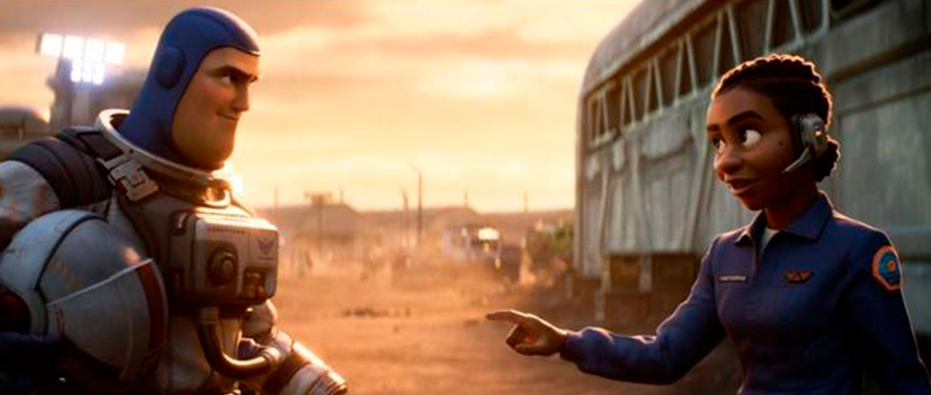 FILE - This image released by Disney/Pixar shows the character Buzz Lightyear, voiced by Chris Evans, at left, and Alisha Hawthorne, voiced by Uzo Aduba, in a scene from the animated film "Lightyear", which will be released on June 17.  (Disney/Pixar via AP, File)