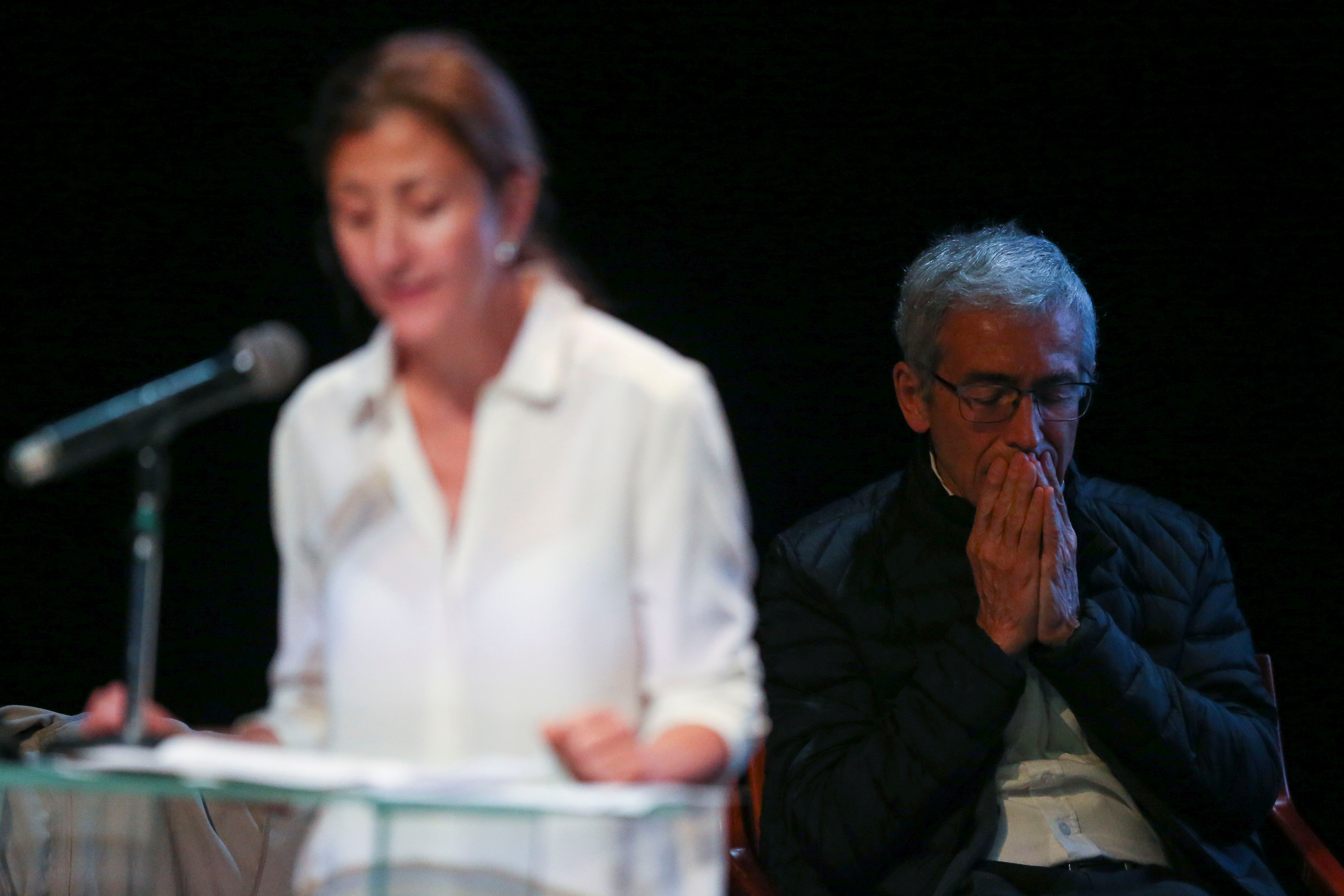 Francisco de Roux, President of the Truth Commission, reacts as he listens Ingrid Betancourt, French-Colombian politician and former FARC hostage, during an act of recognition with the participation of her kidnappers and their now political party Comunes, in Bogota, Colombia June 23, 2021. REUTERS/Luisa Gonzalez