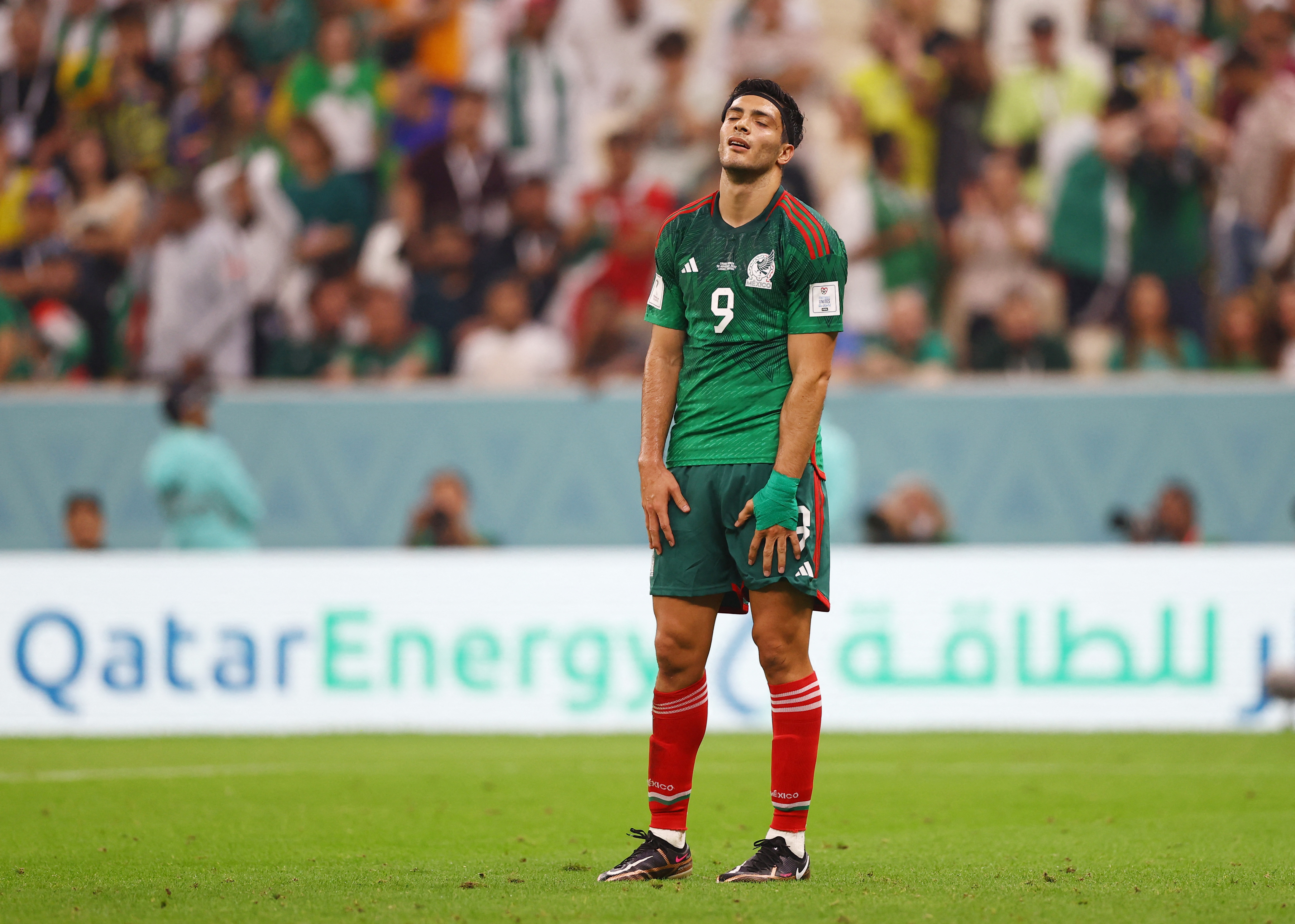 Soccer Football - FIFA World Cup Qatar 2022 - Group C - Saudi Arabia v Mexico - Lusail Stadium, Lusail, Qatar - November 30, 2022 Mexico's Raul Jimenez looks dejected after being eliminated from the World Cup REUTERS/Matthew Childs