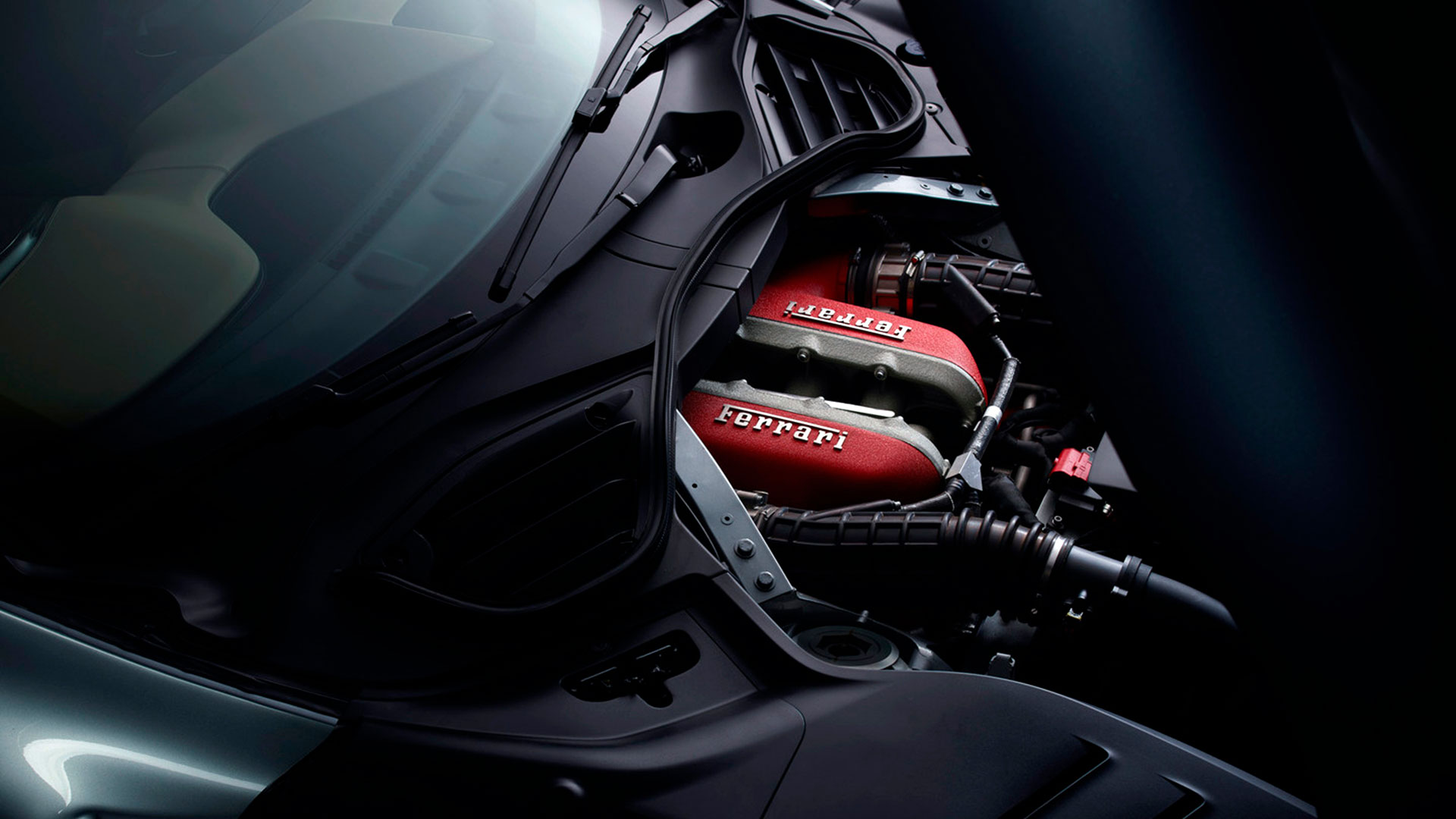 The location of the 6.5 liter V12 is nearly central as it is positioned inside the cabin to carry weight to the rear.