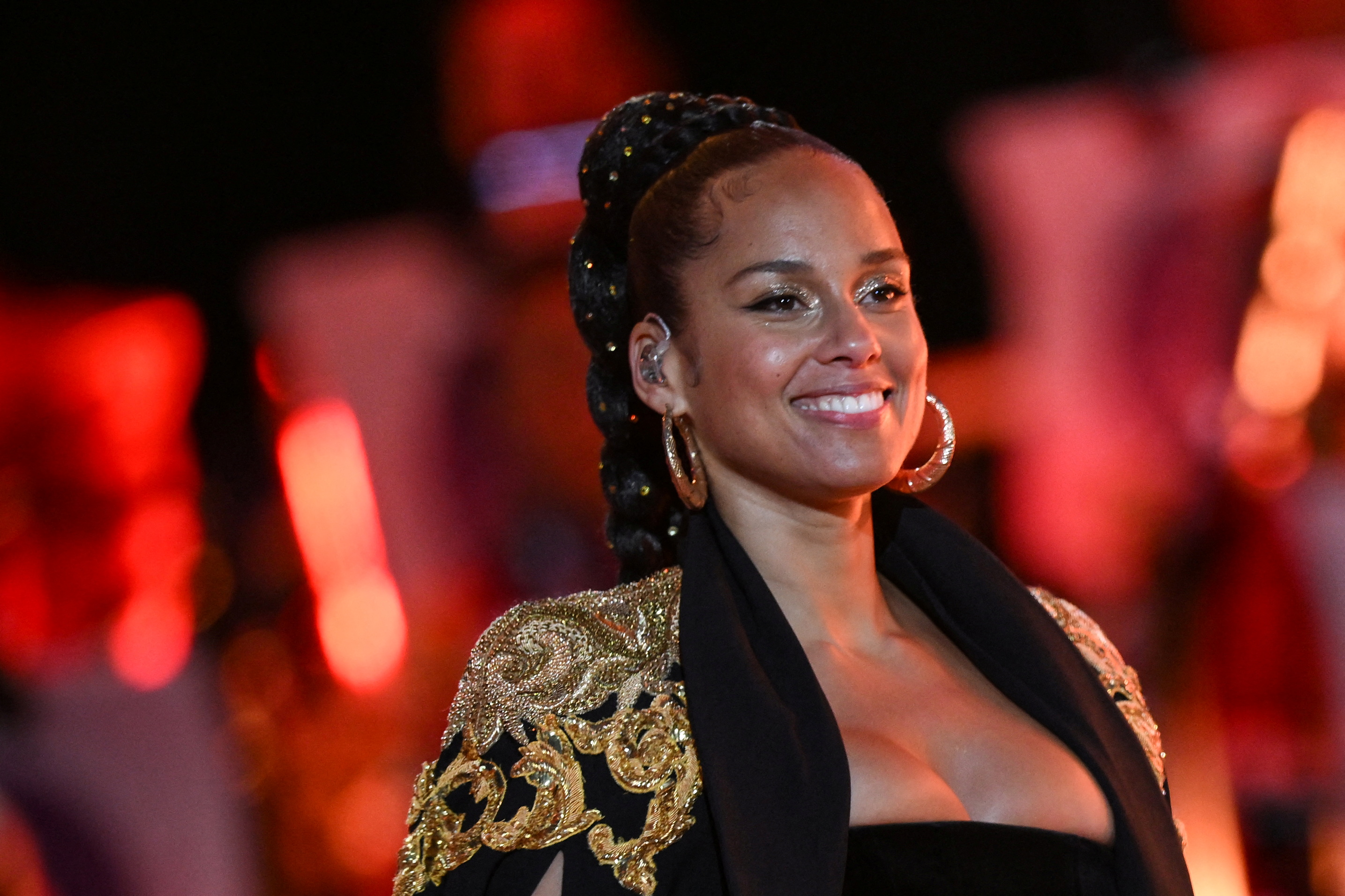 US singer and pianist Alicia Keys arrives to perform during the Platinum Party at Buckingham Palace on June 4, 2022 as part of Queen Elizabeth II's platinum jubilee celebrations. - Some 22,000 people and millions more at home are expected at a star-studded musical celebration for Queen Elizabeth II's historic Platinum Jubilee. Daniel LEAL/Pool via REUTERS