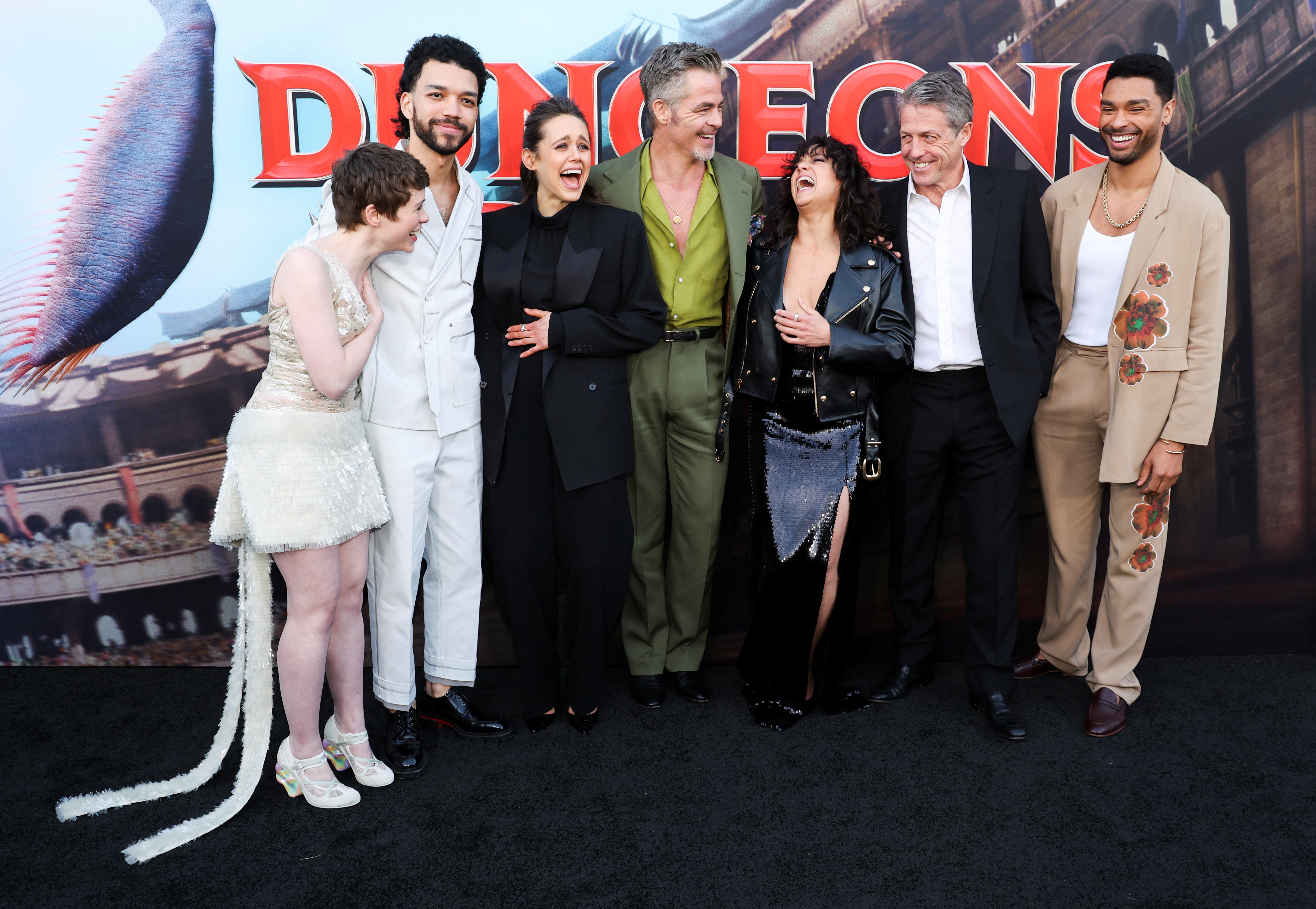 Cast members Sophia Lillis, Justice Smith, Daisy Head, Chris Pine, Michelle Rodriguez, Hugh Grant and Rege-Jean Page attend a premiere for the film Dungeons & Dragons: Honor Among Thieves in Los Angeles, California, U.S., March 26, 2023. REUTERS/Mario Anzuoni REFILE - QUALITY REPEAT