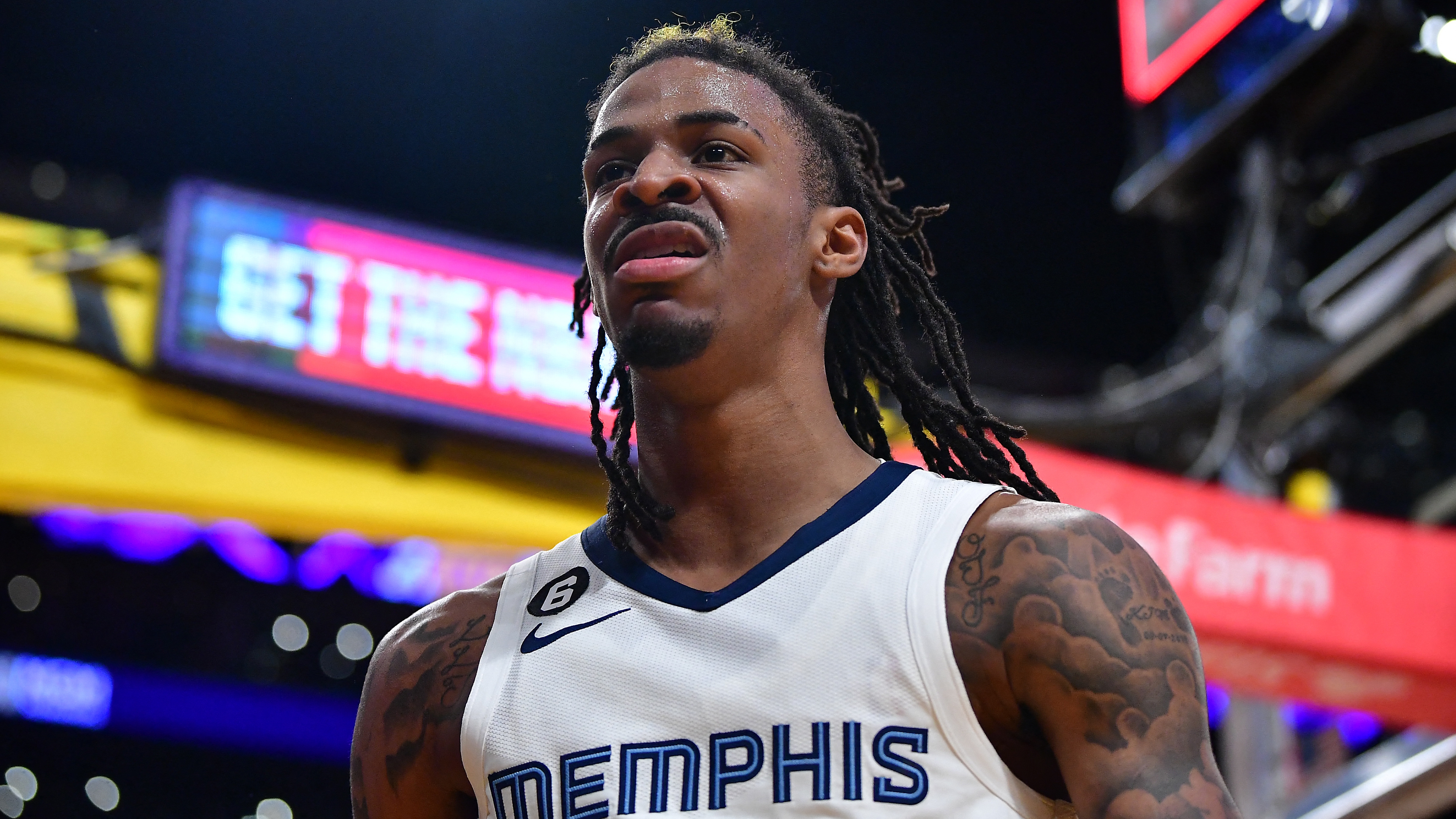 Apr 24, 2023; Los Angeles, California, USA; Memphis Grizzlies guard Ja Morant (12) reacts after scoring a basket against the Los Angeles Lakers during the second half in game four of the 2023 NBA playoffs at Crypto.com Arena. Mandatory Credit: Gary A. Vasquez-USA TODAY Sports
