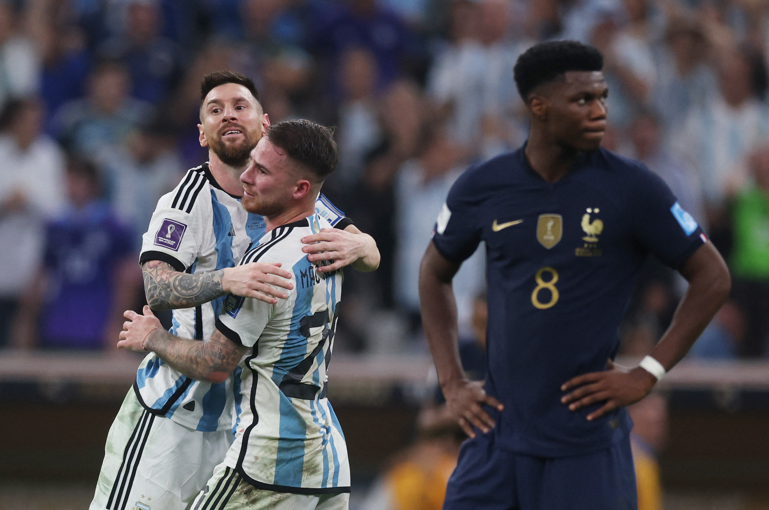 Soccer Football - FIFA World Cup Qatar 2022 - Final - Argentina v France - Lusail Stadium, Lusail, Qatar - December 18, 2022 Argentina's Lionel Messi celebrates scoring their third goal with Alexis Mac Allister REUTERS/Lee Smith