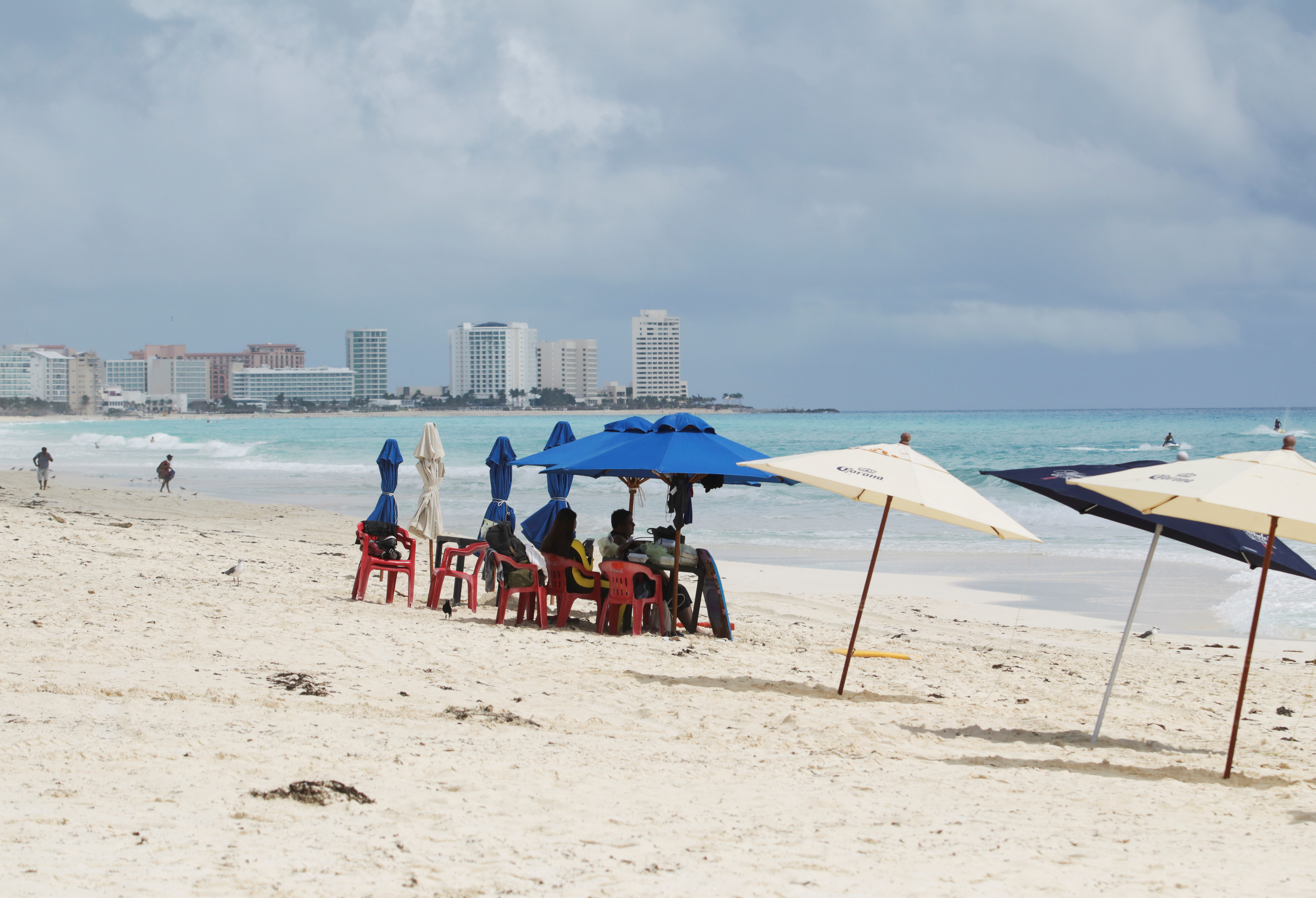 FILE PHOTO: Tourists are seen at a beach in Cancun, Mexico October 6, 2020. REUTERS/Jorge Delgado/File Photo