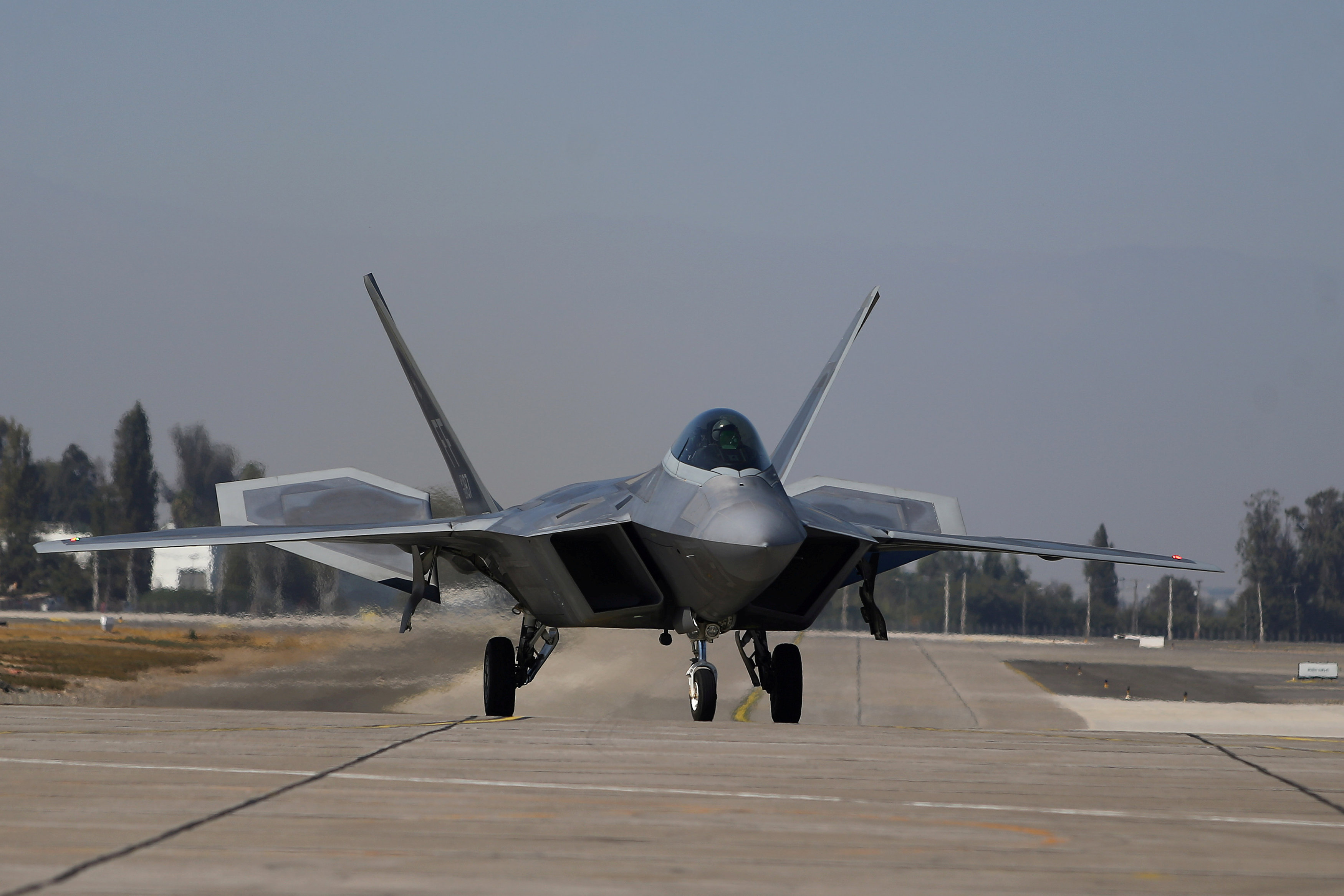 FILE PHOTO: A U.S. Air Force F-22 Raptor fighter jet is seen after a performance ahead of the International Air and Space Fair (FIDAE) at Santiago international airport