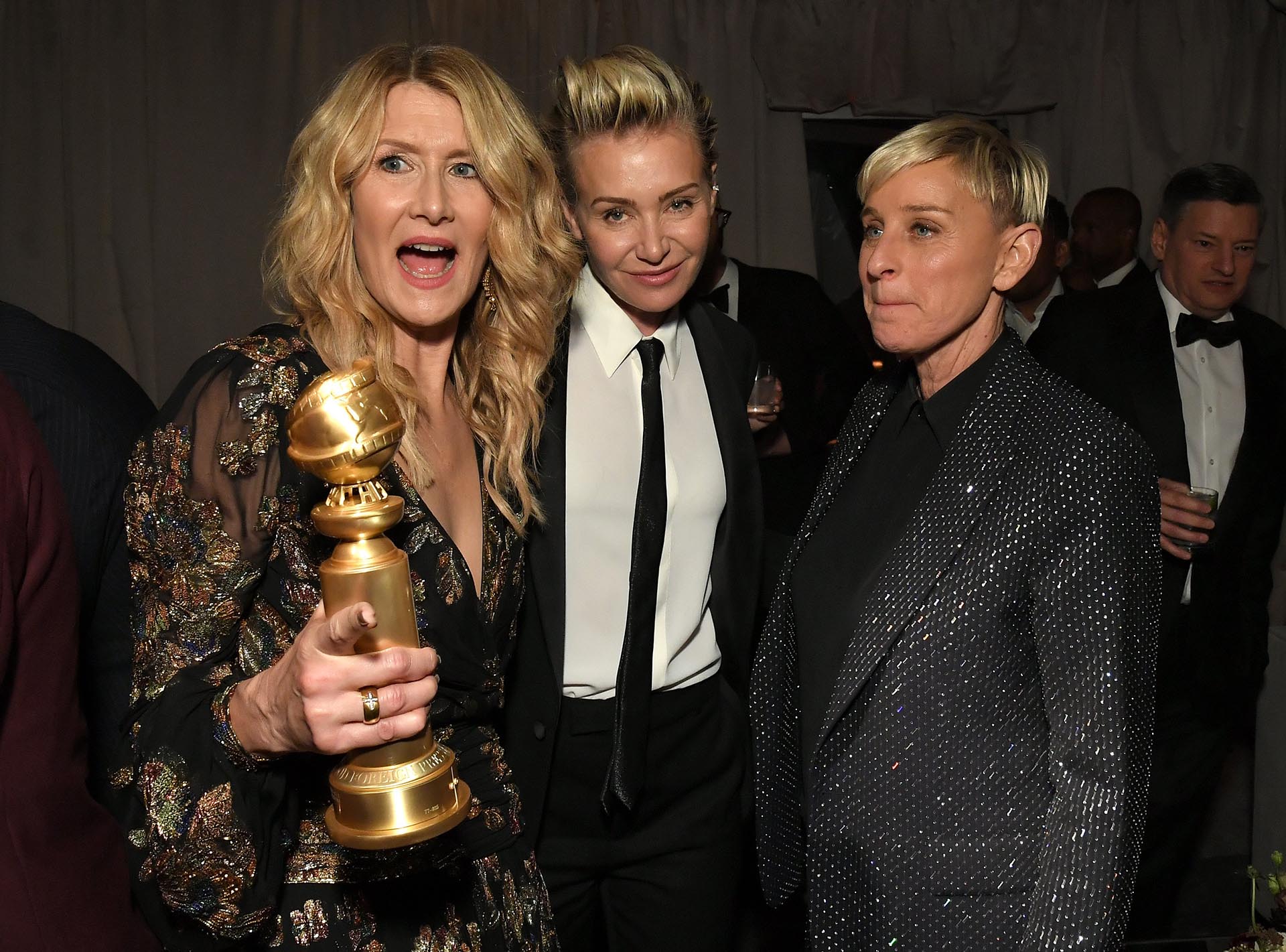 Laura Dern, Portia de Rossi y Ellen DeGeneres en los festejos de los Globos de Oro, el 5 de enero de este año (Foto: Shutterstock)