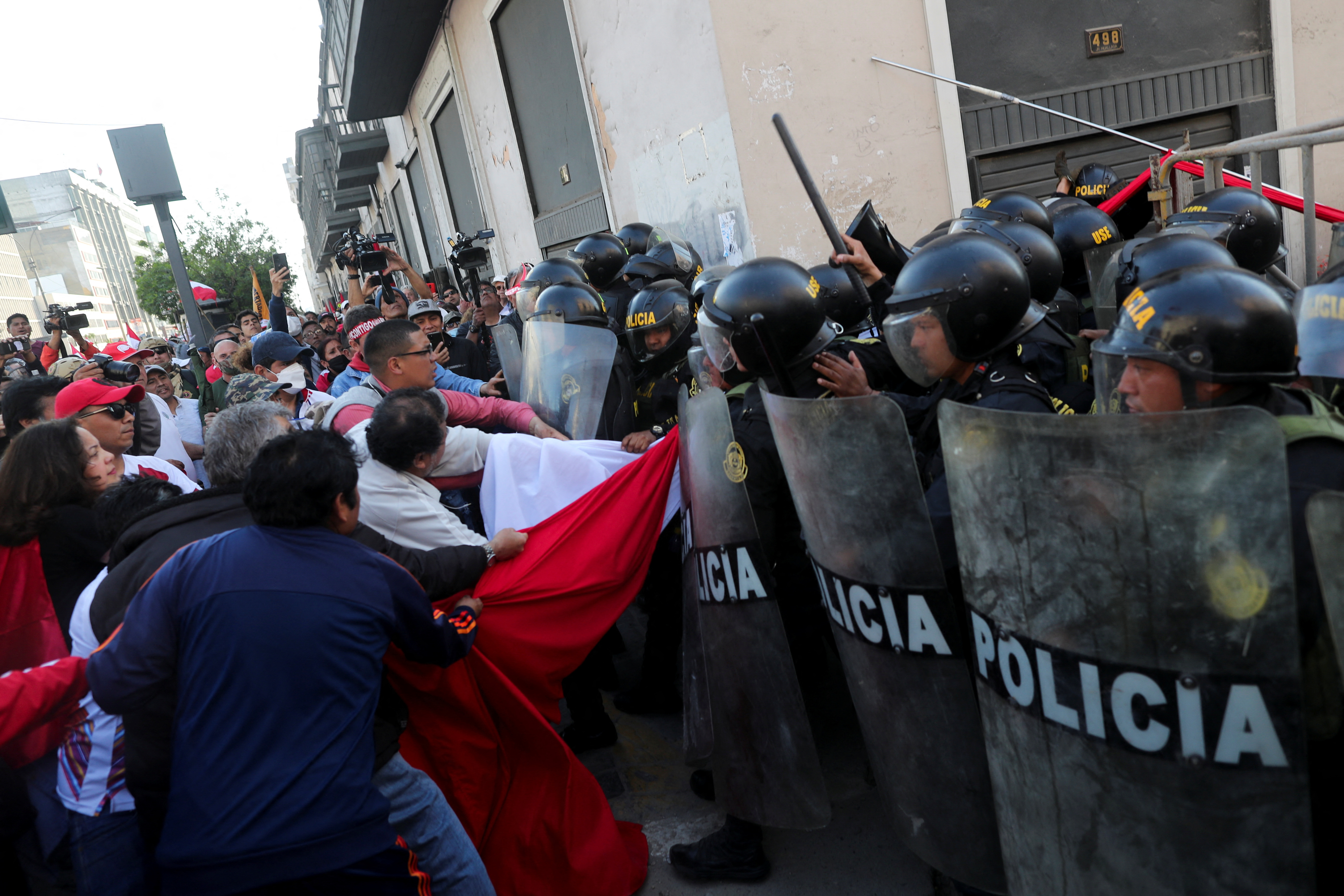 People clash with police as they protest against the government of Peru's President Pedro Castillo, in Lima, Peru November 5, 2022. REUTERS/Sebastian Castaneda