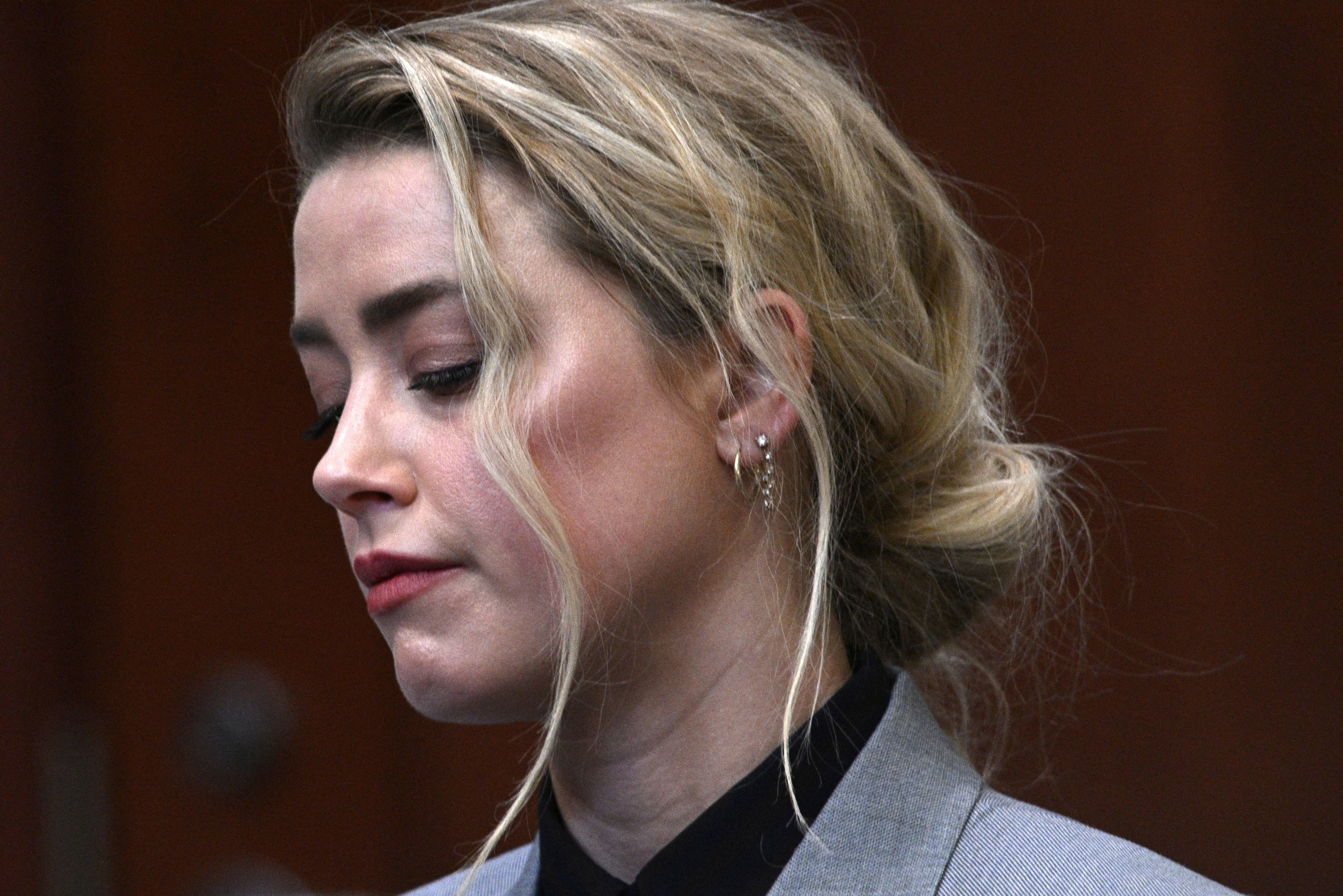 Amber Heard attends a court hearing (Reuters)