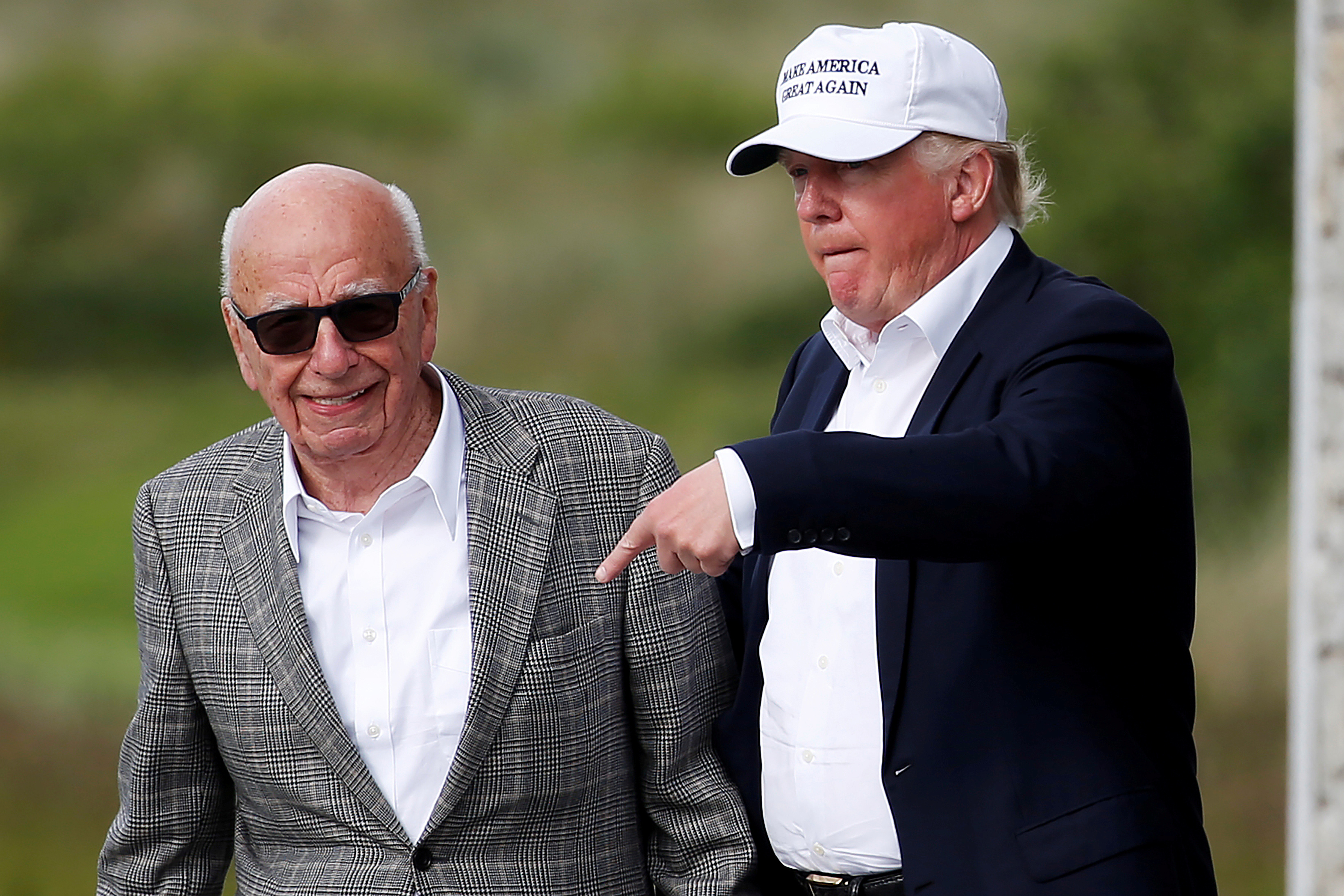 Donald Trump and Rupert Murdoch in 2016 (REUTERS / Carlo Allegri)