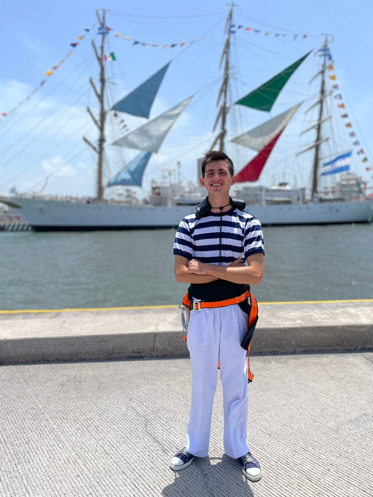 Hernán Pedemonte, Commissioned Midshipman, in the port of Veracruz, Mexico, with the frigate ARA Libertad in the background