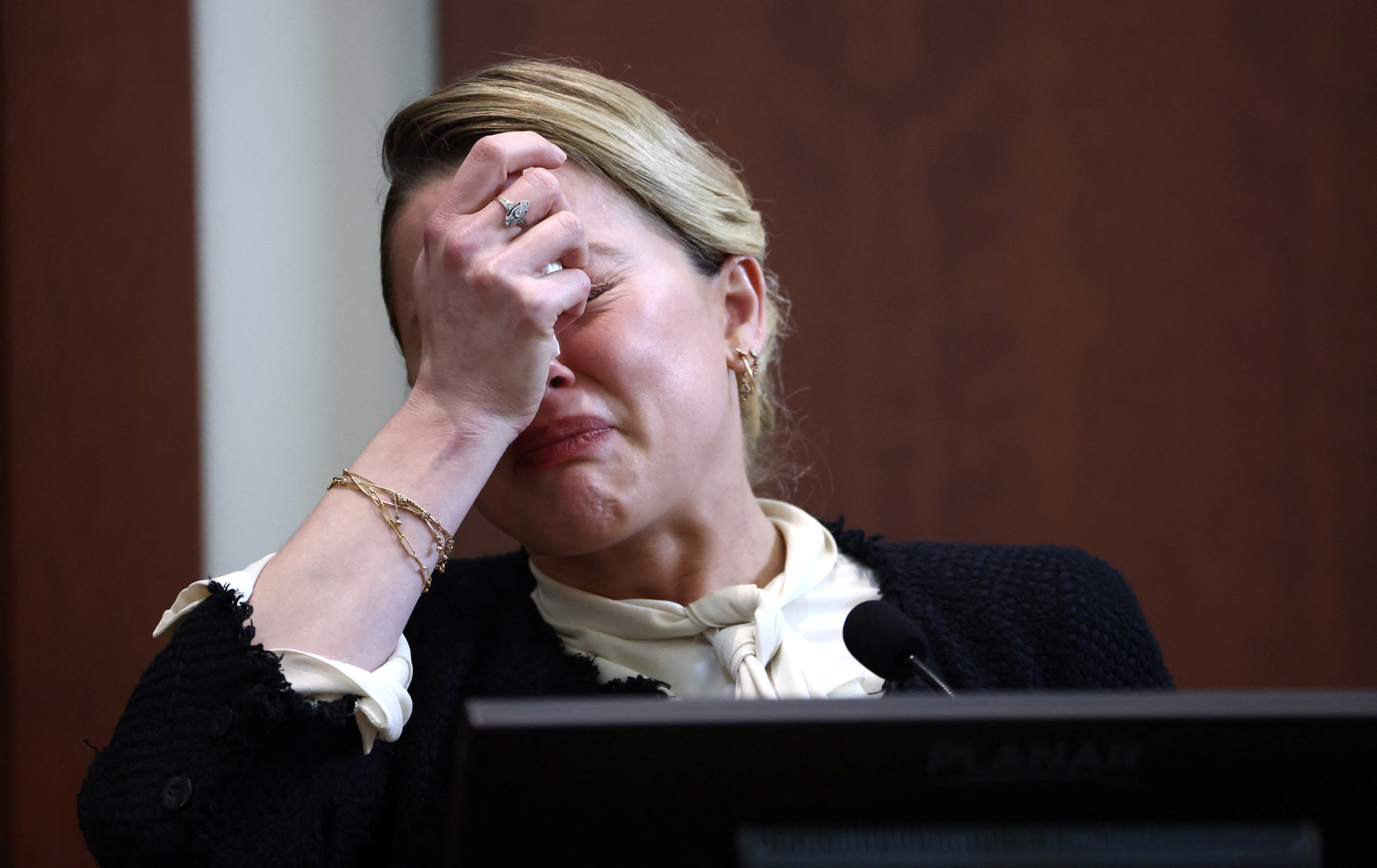 Amber Heard cries on the stand during her testimony (Jim Lo Scalzo/REUTERS)