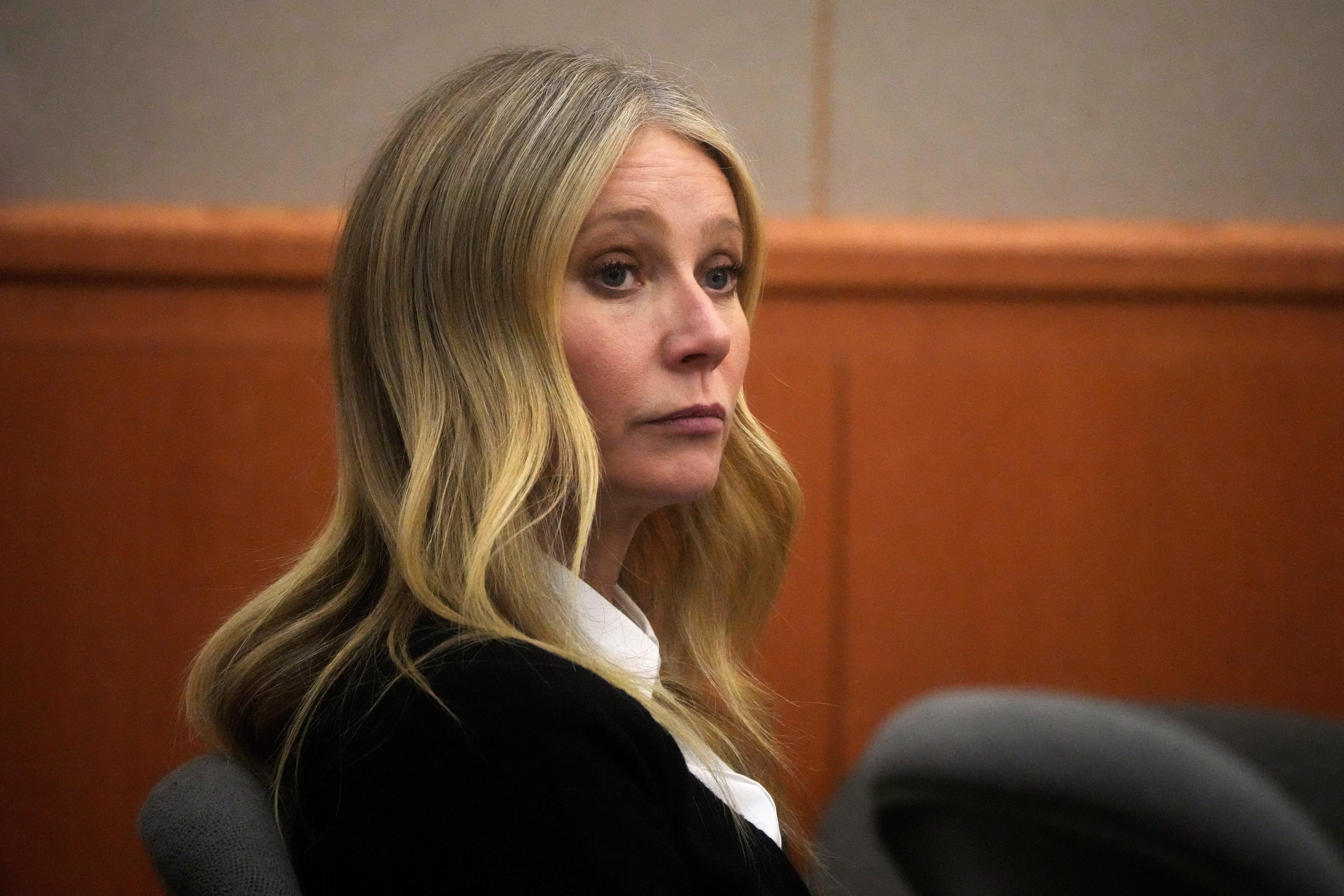 Gwyneth Paltrow sits in court during an objection by her attorney at her trial, Monday, March 27, 2023, in Park City, Utah, U.S.,. Paltrow is accused in a lawsuit of crashing into a skier during a 2016 family ski vacation, leaving him with brain damage and four broken ribs. Rick Bowmer/Pool via REUTERS
