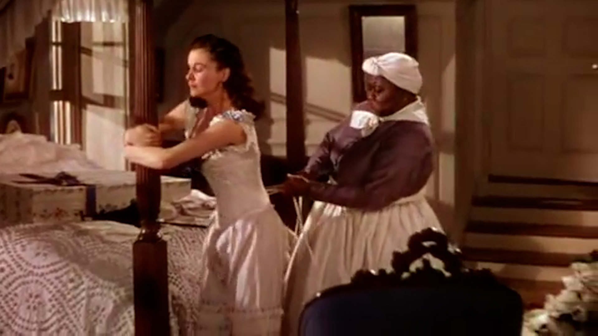 Scarlet and Mammy tie a corset "gone With the Wind"